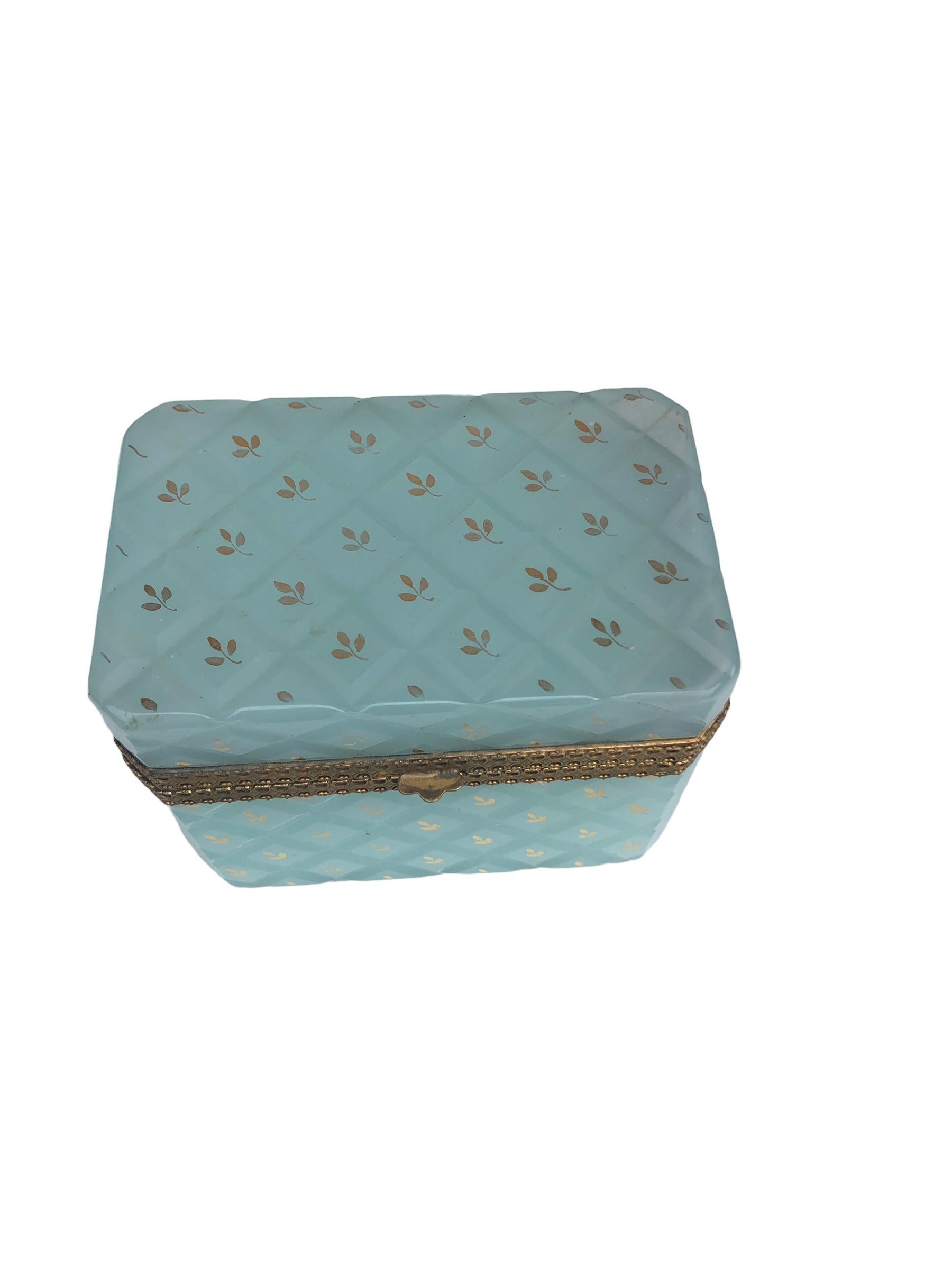 French Art Deco Blue Opaline Box. A beautiful box in a lovely robins blue egg color with a diamond shaped cut pattern and gilt leaf design. 