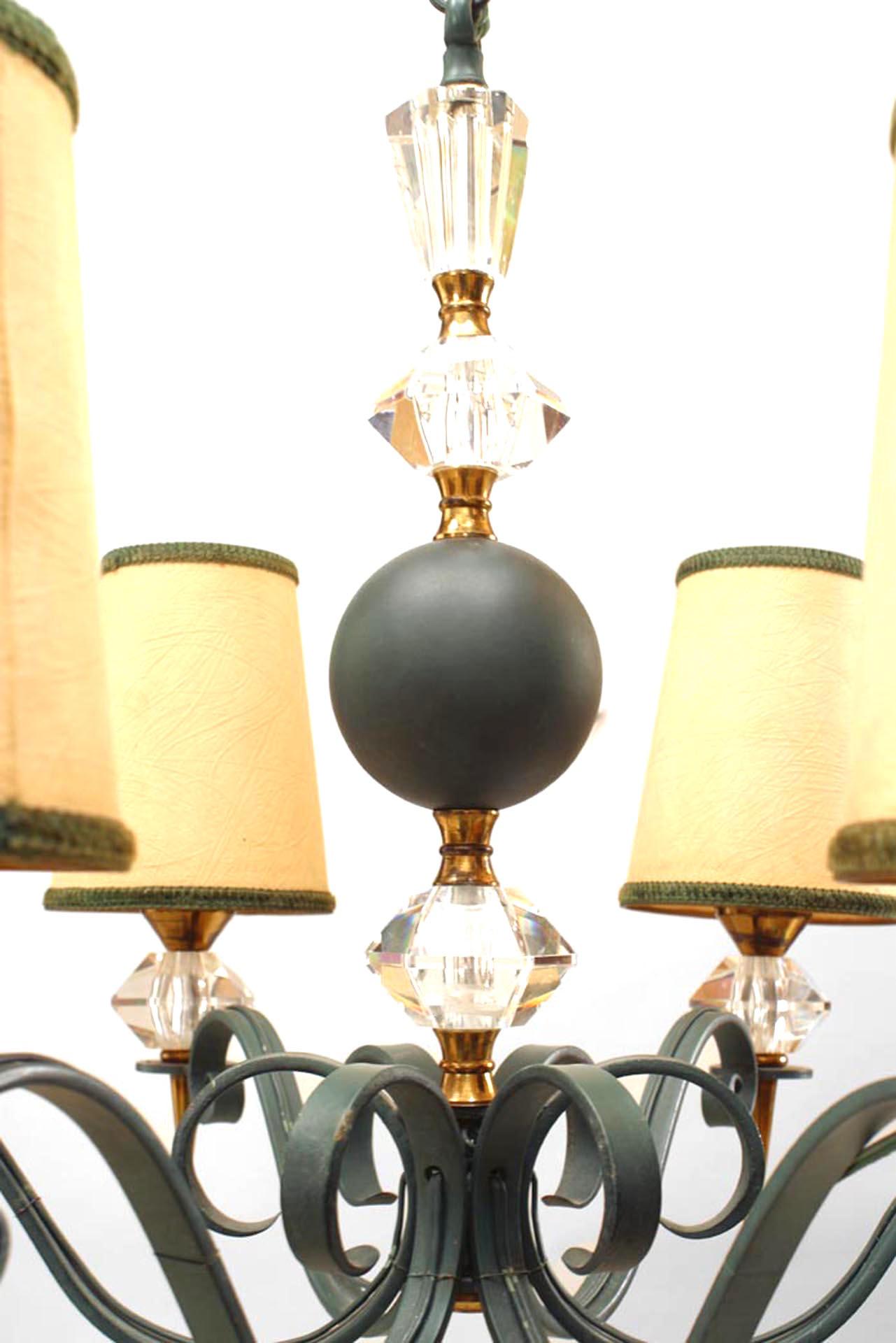 French Mid-Century (1940s) cut glass, brass and green painted chandelier, the faceted shaft issuing six scrolling arms with tapering finials. (Attributed to JULES LELEU)
