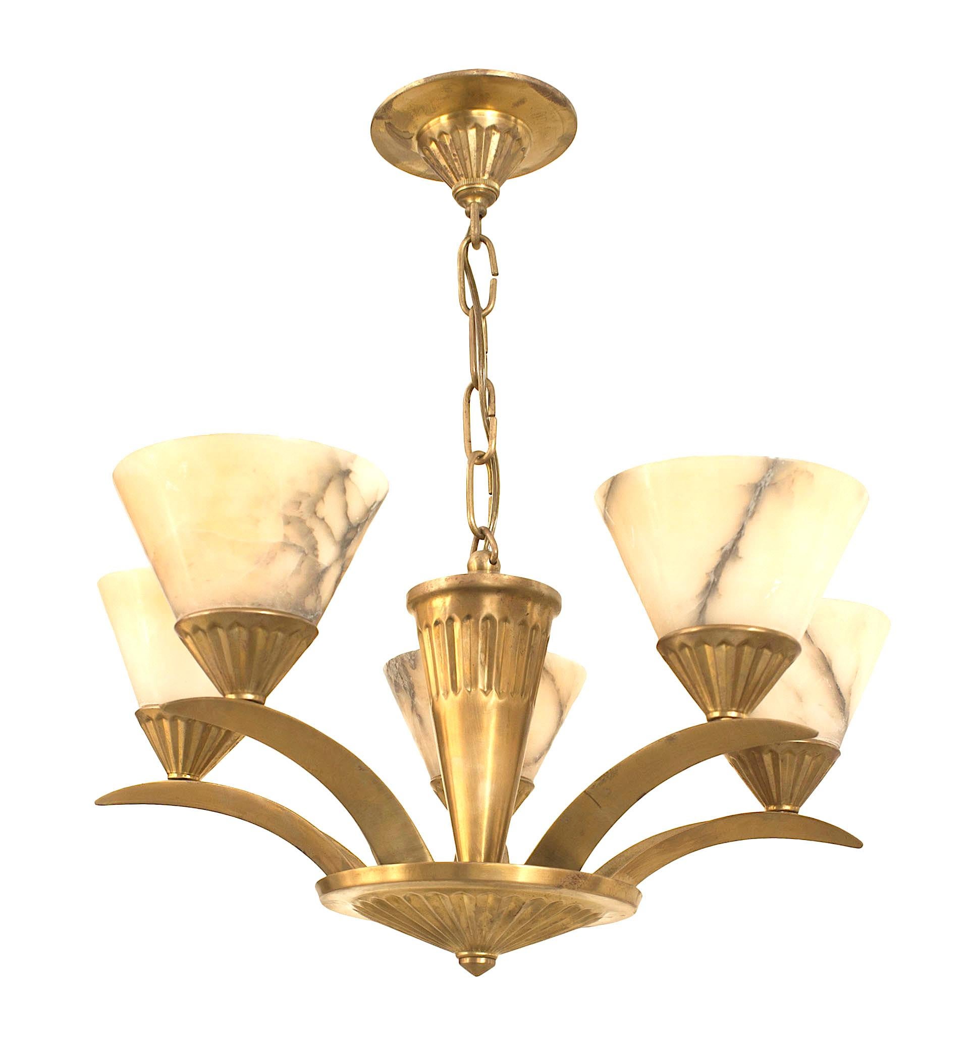 French Art Deco brass (circa 1925) chandelier with 5 flaired arms emanating from a cone form center and supporting conical shaped alabaster shades.

