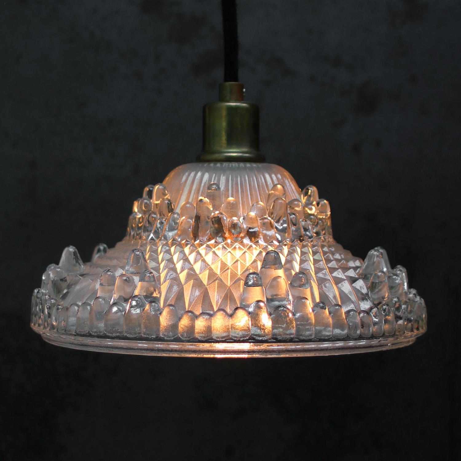 1920 French Art Deco clear, etched glass pendant lamp
Brass glass holder

E14 bulb holder

Weight: 1.10 kg / 2.4 lb

E14 bulb holder. Priced per individual item. All lamps have been made suitable by international standards for incandescent light