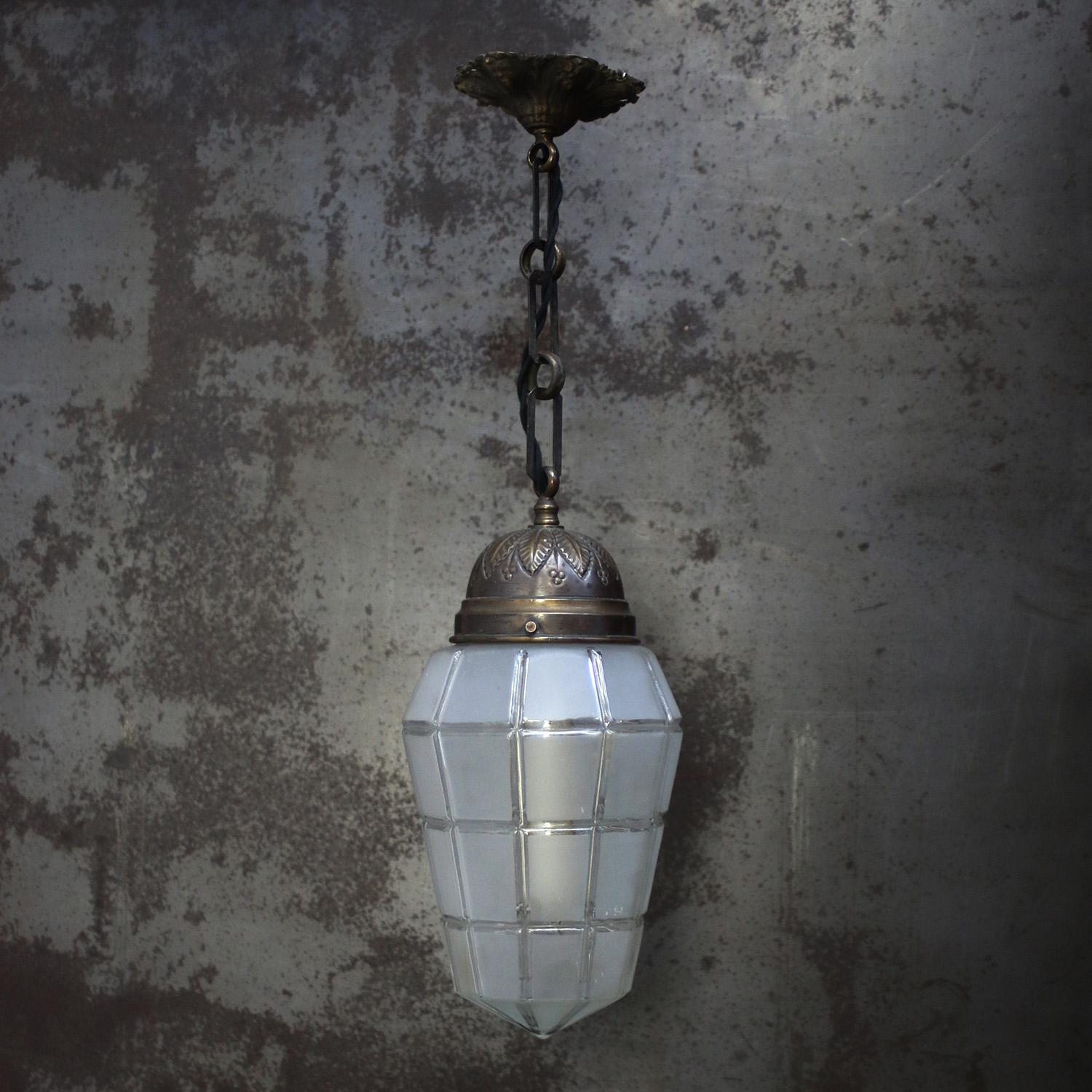 1920s French Art deco pendant light
Brass top with cut glass shade

Height including canopy and chain : 60 cm / 23.6”

Diameter ceiling plate : 12 cm / 4.7”

Weight: 1.30 kg / 2.9 lb

Priced per individual item. All lamps have been made suitable by