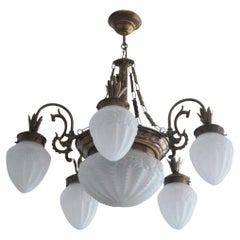 French Art Deco Brass Frosted High Relief Glass Seven-Light Chandelier