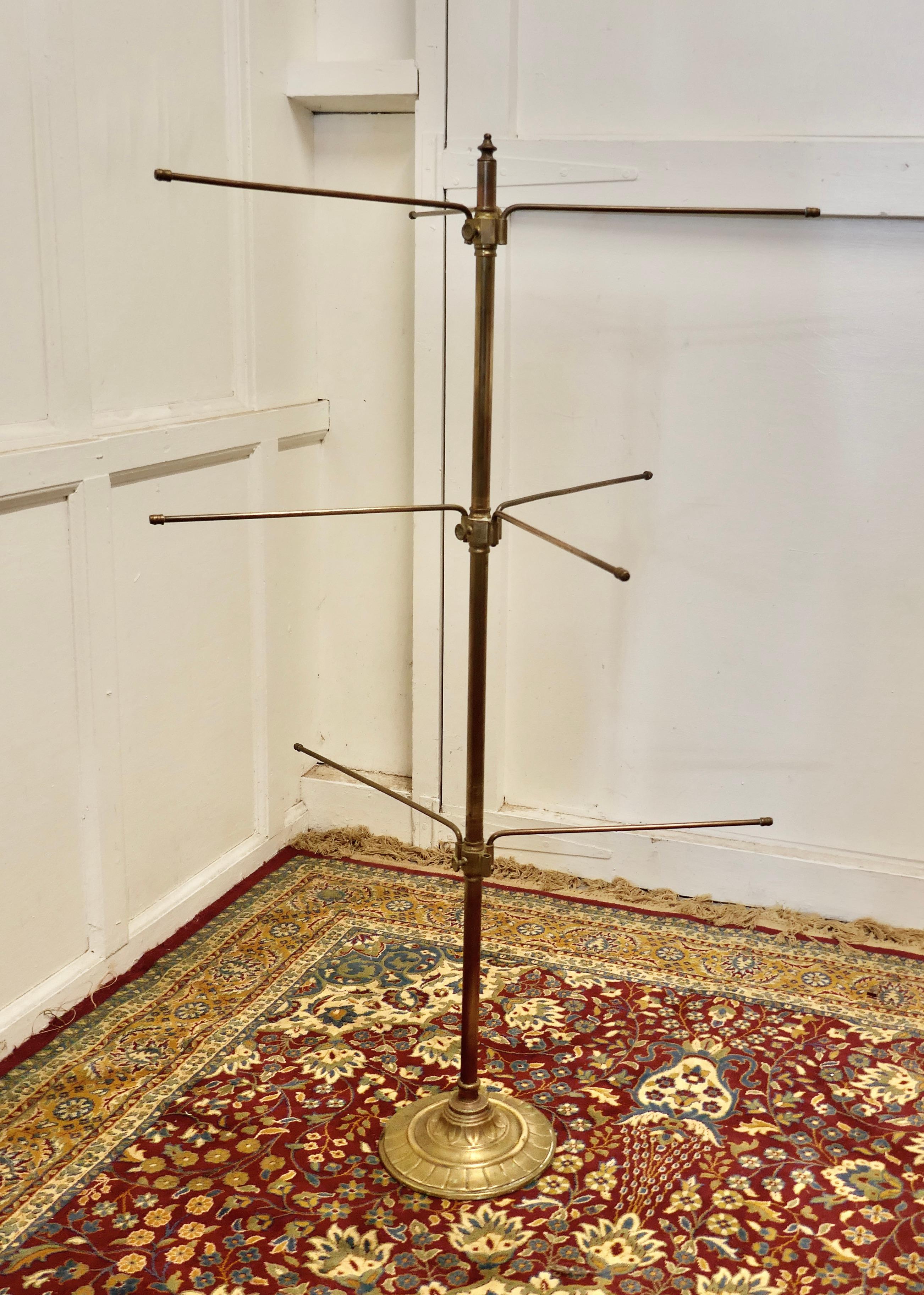 French Art Deco brass haberdashery window display stand

A handy little piece made in brass, the stand has swivel arms with can be set at any angle from the central column, there are 3 of these arms from 2 levels and 2 from the other 

The stand