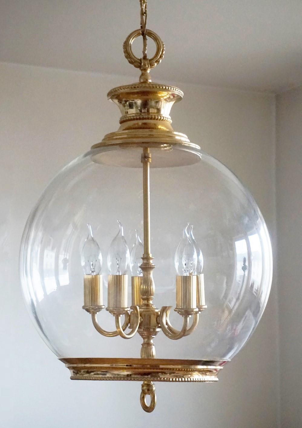A large Art Deco hand blown glass lantern with elegant brass mounts, France, 1930-1939.
Five E-14 candelabra bulb sockets.
Measures:
Overall height with chain and canopy: 52