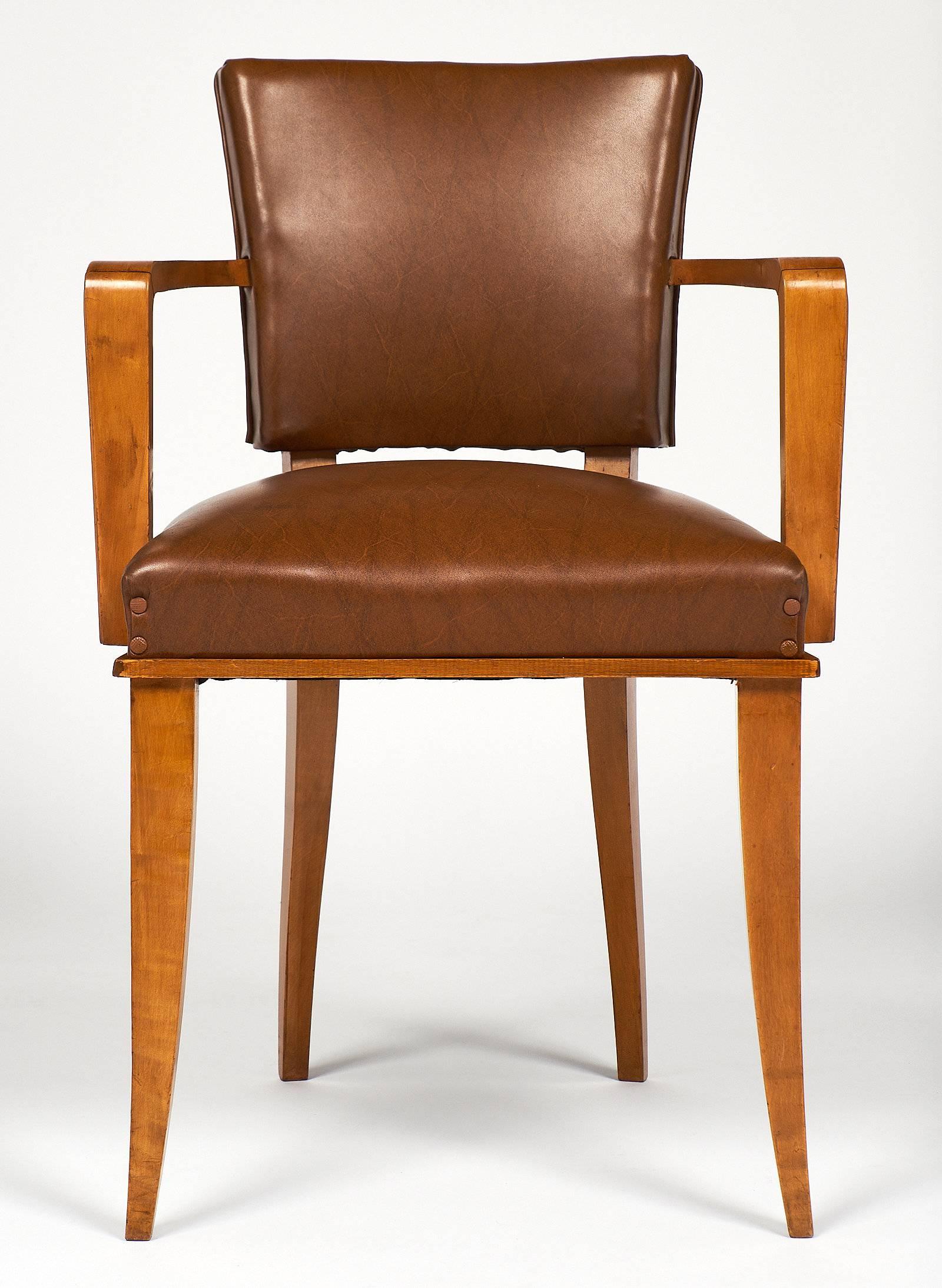 Set of four Art Deco French bridge chairs with a lustrous French polish finish. The wood is all cherrywood, and they are upholstered in the original brown vinyl. These are compact, elegant, and very comfortable.