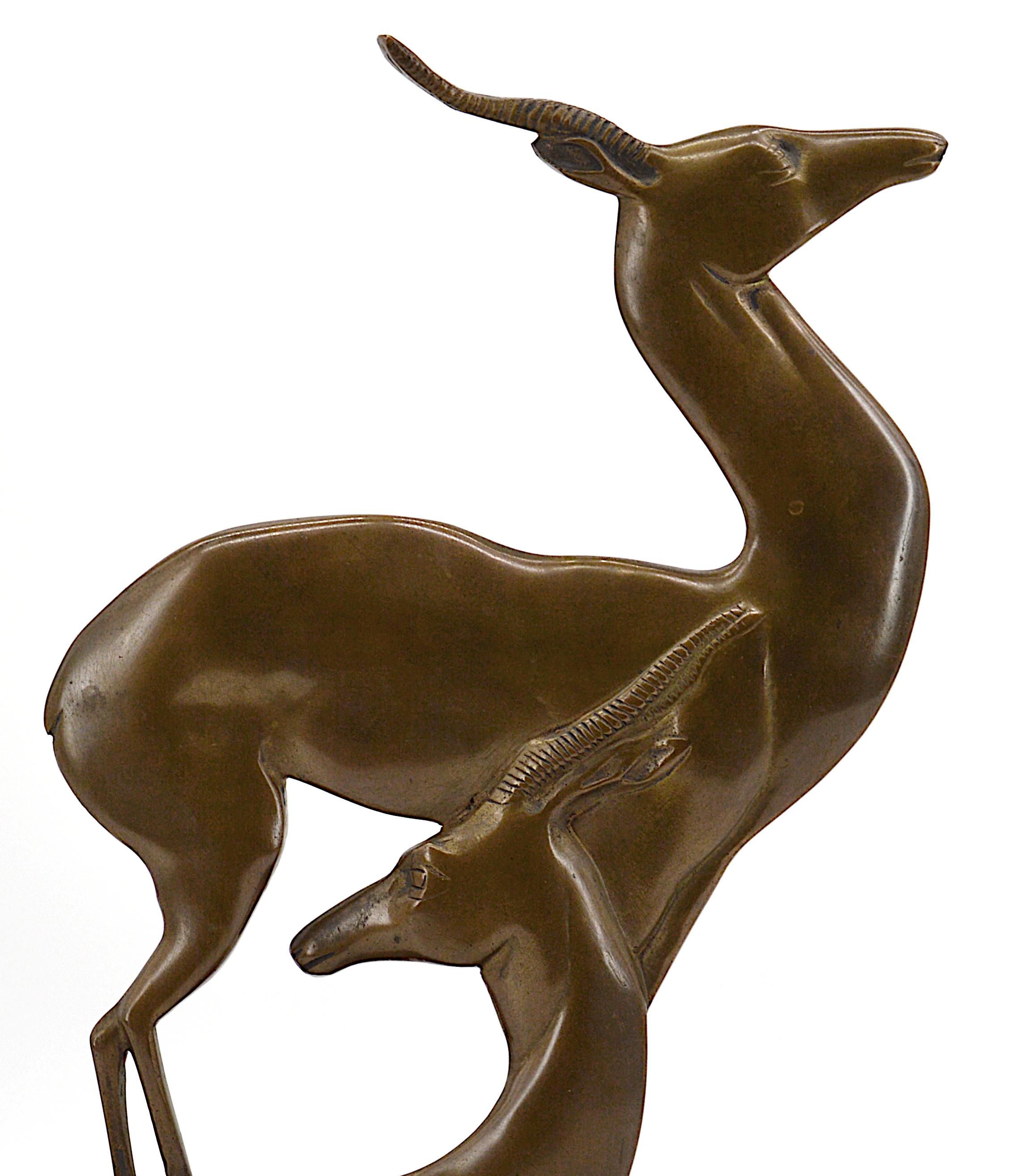 French Art Deco antelope couple sculpture, France, 1930s. Bronze and marble. Superb model, pure and sharp.
