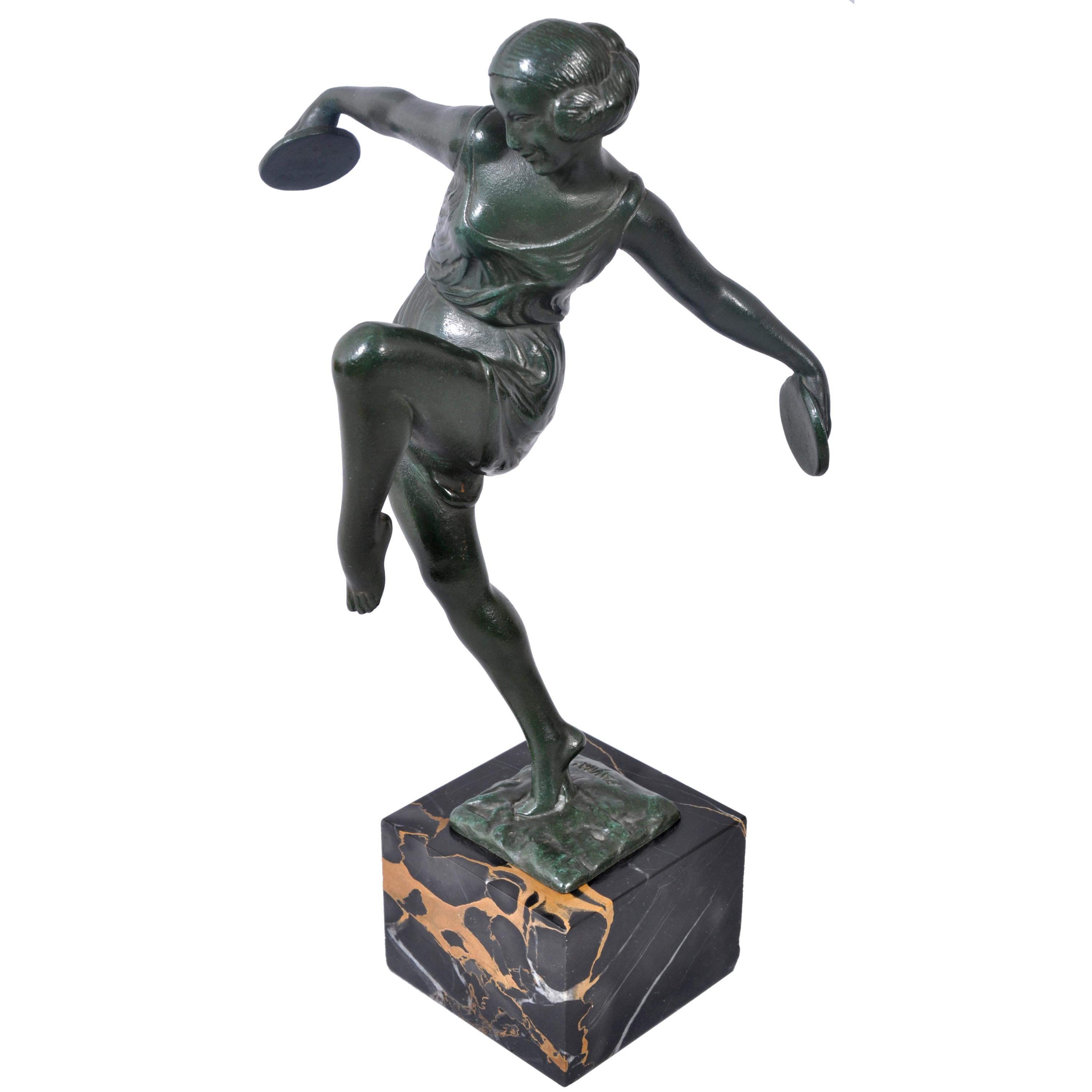 A good, original, Art Deco bronze statue by Pierre Le Faguays (1892-1962), circa 1925. The bronze depicting a lovely young lady dancing with cymbals, the bronze is raised on the original variagated marble base and is signed 