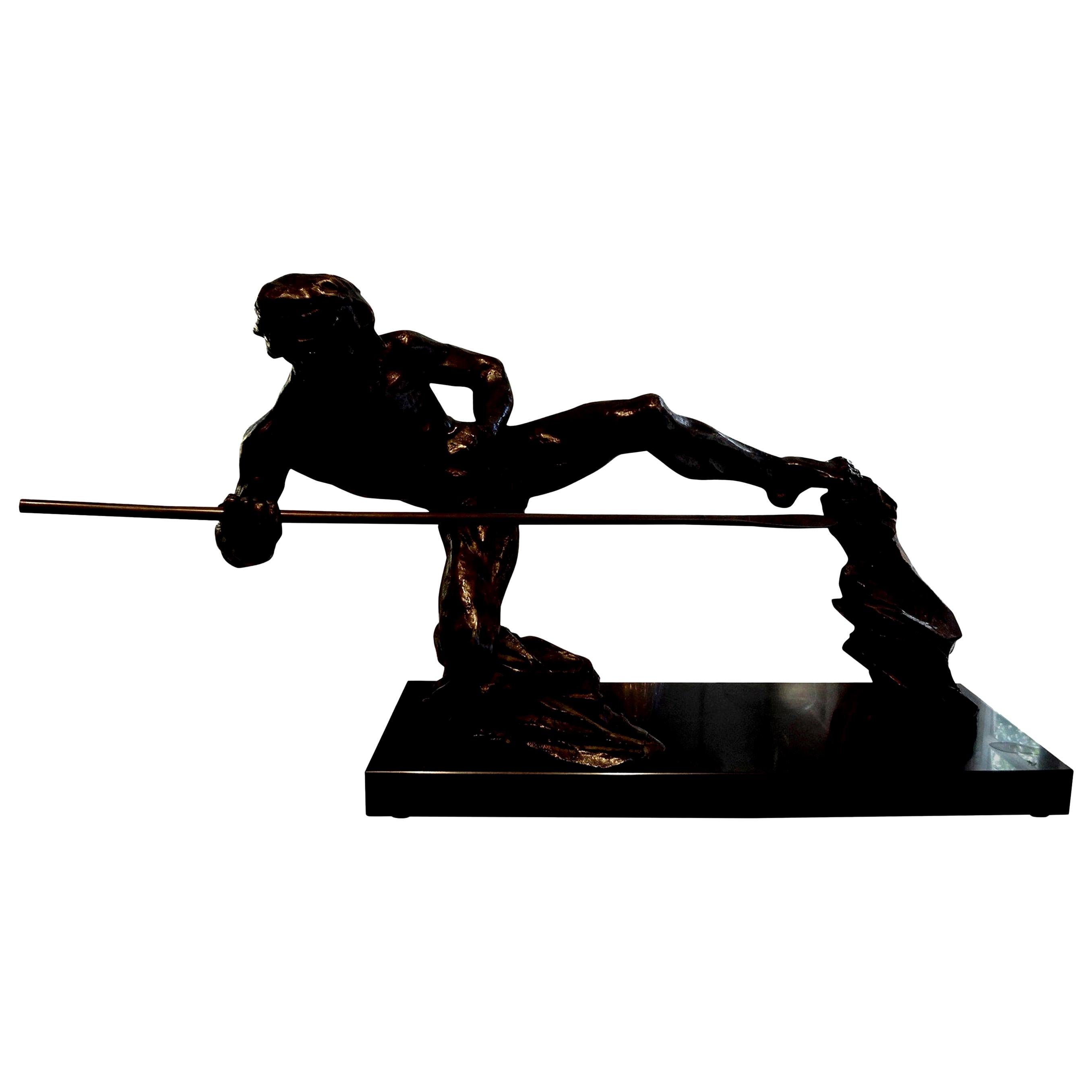 Beautifully executed French Art Deco bronze sculpture of an athlete on a black marble base, circa 1930. This Art Deco bronze is signed (see photos), however we are unable to identify the artist.