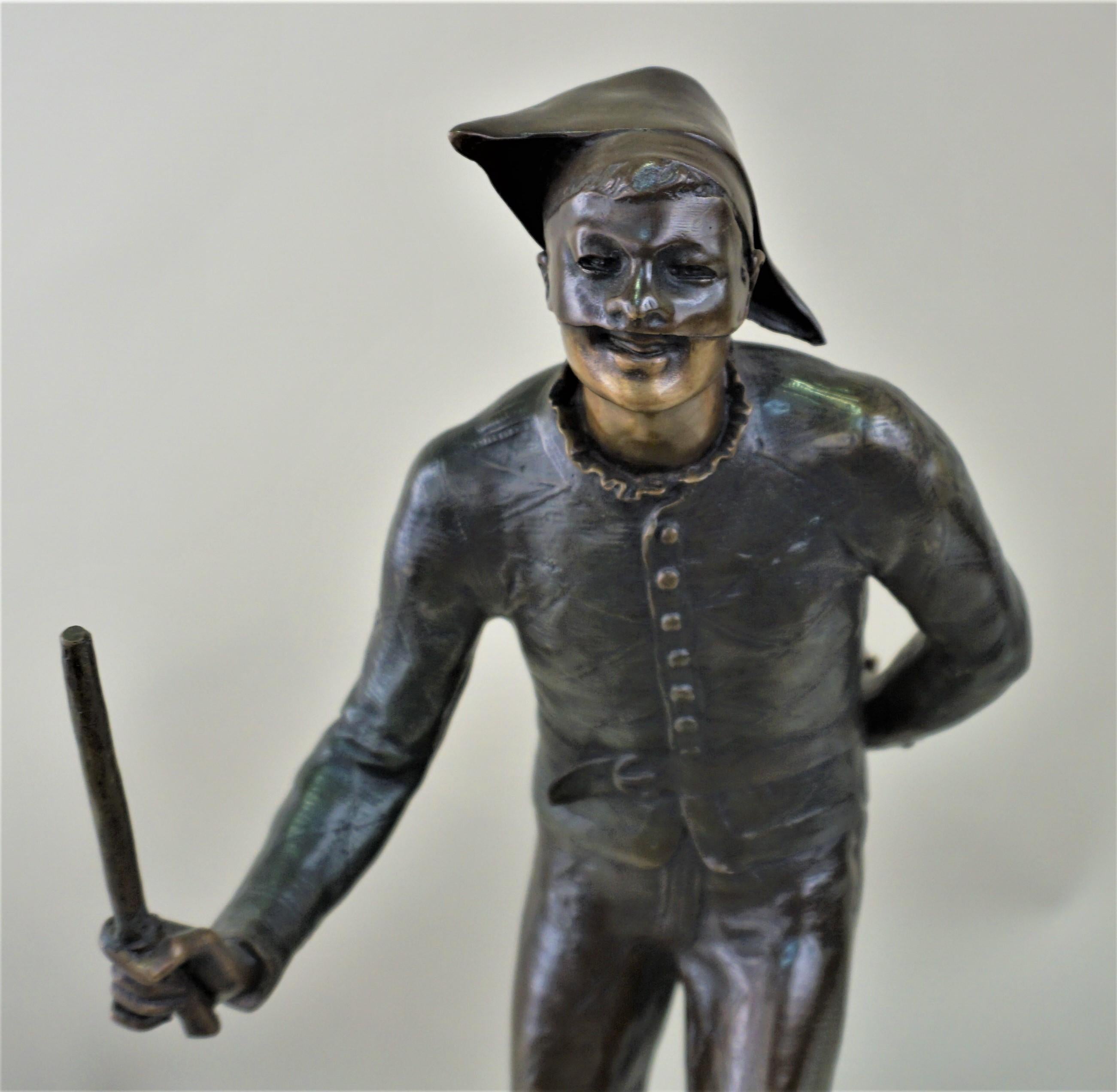 French bronze in dark green and brown patina of harlequin.