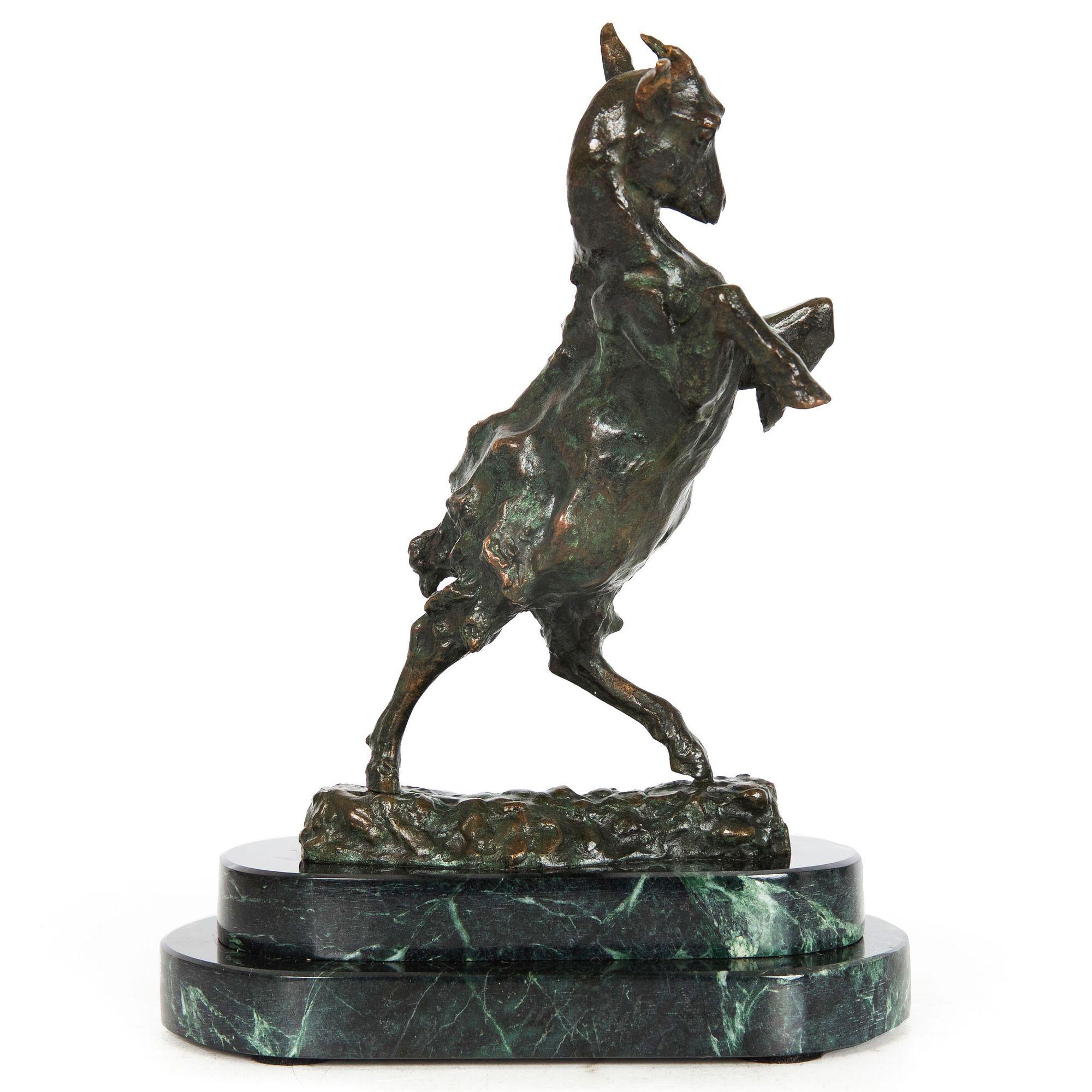 A very nice modeling of a young goat rooted on its backlegs as its body spins in the air, raising its hooves and lowering its head in that familiar playful jumping dance. Designed as a bookend and generally offered in pairs, the present example is a