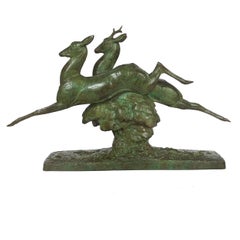 Sculpture en bronze Art Déco française "Cerf et biche bondissants" par André-Vincent Becquerel