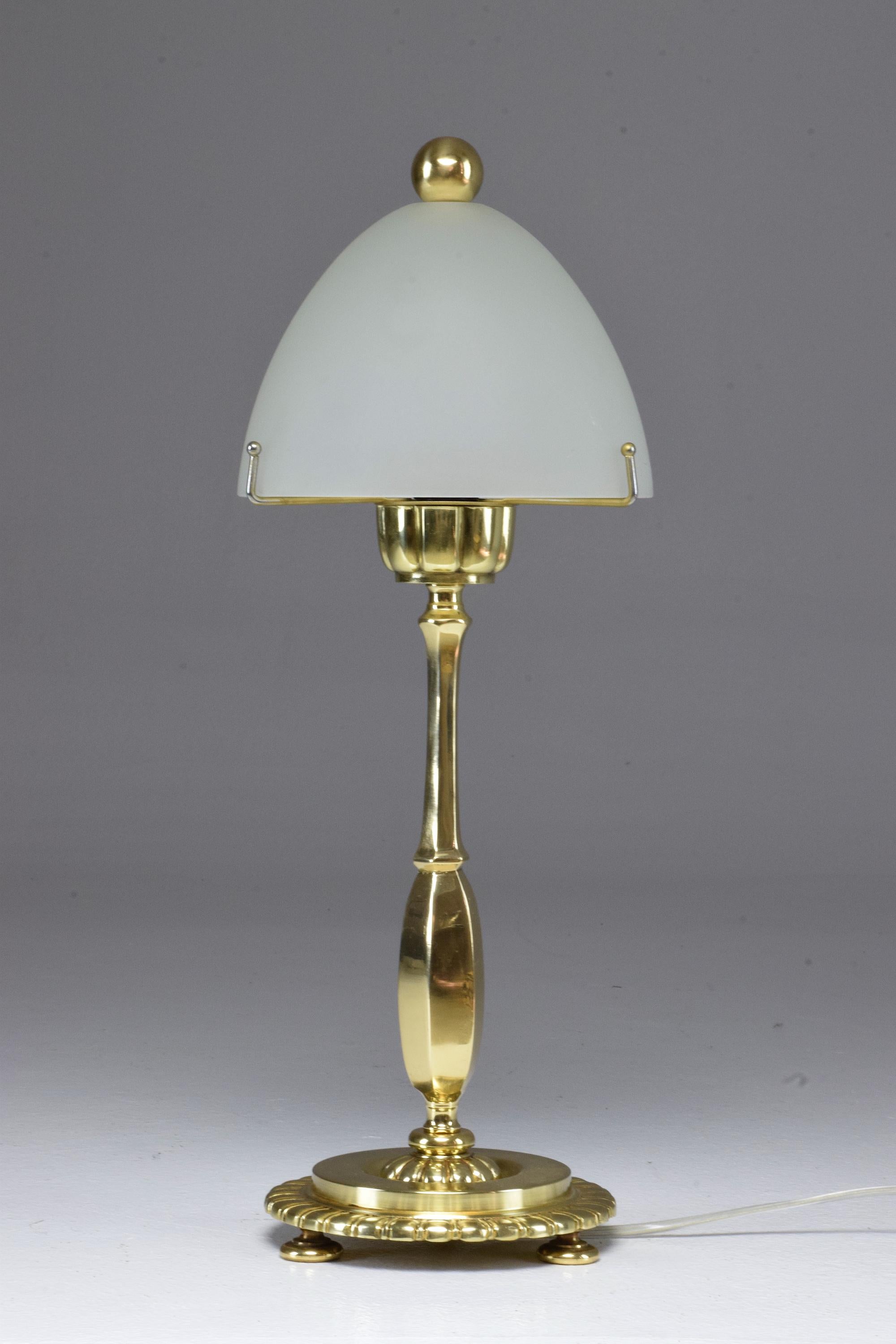A 20th century vintage French table lamp by Henry Petitot circa 1930s cast in solid bronze and original molded opaque glass.
Signed at the base.

----
We are an exhibition space and an online destination established by Jonathan Amar Studio. All our