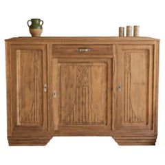 Buffet Art déco français, noyer sculpté, panneaux floraux, années 1930