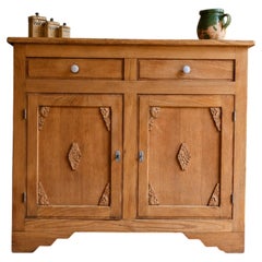 Buffet Art déco français, chêne massif, panneaux sculptés, années 1930