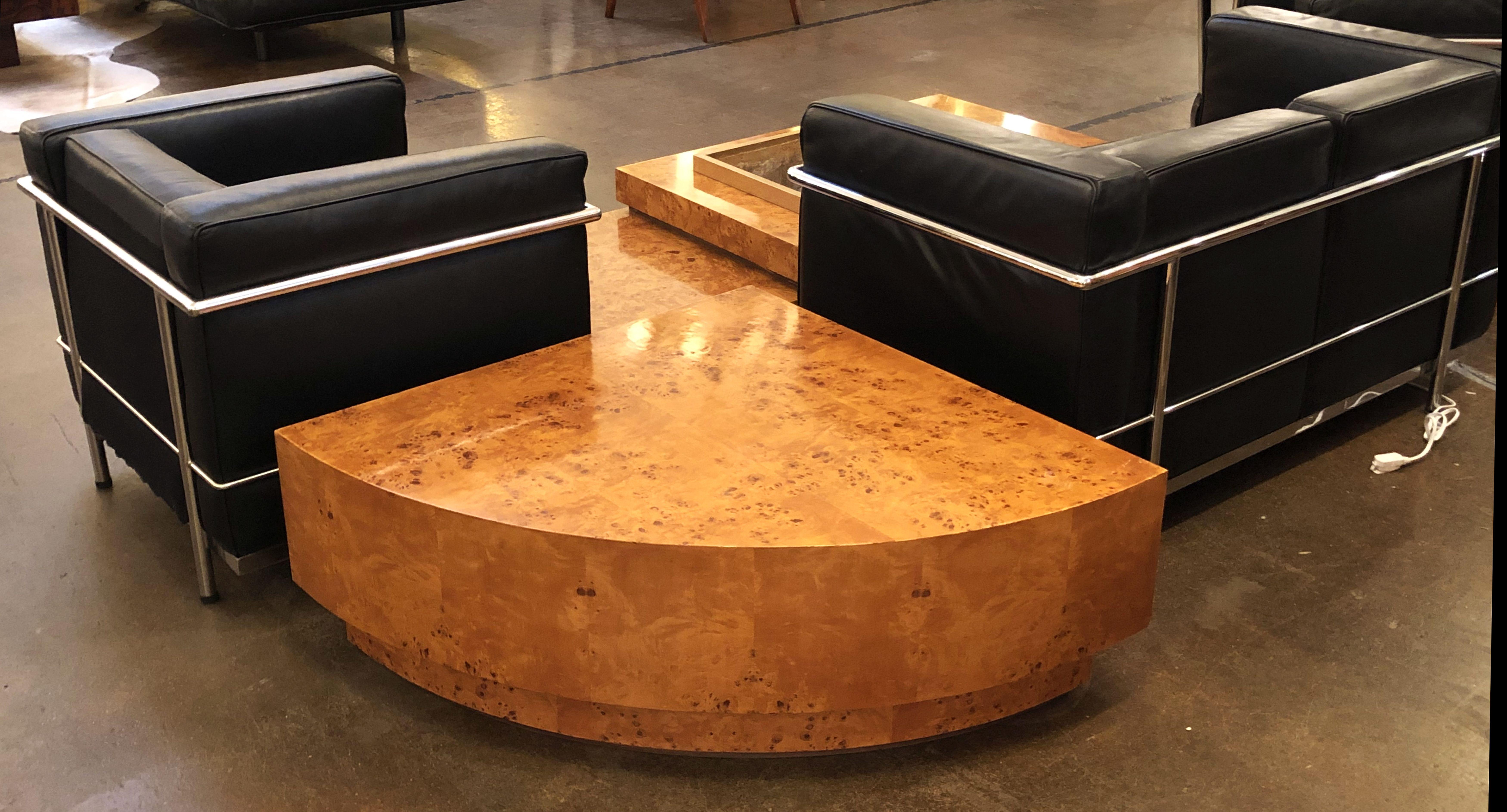 A fine French Art Deco style low table or coffee or cocktail table, of burled wood with brass accents, attributed to the designer, Jean Claude Mahey.
Featuring stylish architectural or sculptural design - this triangular corner table was designed