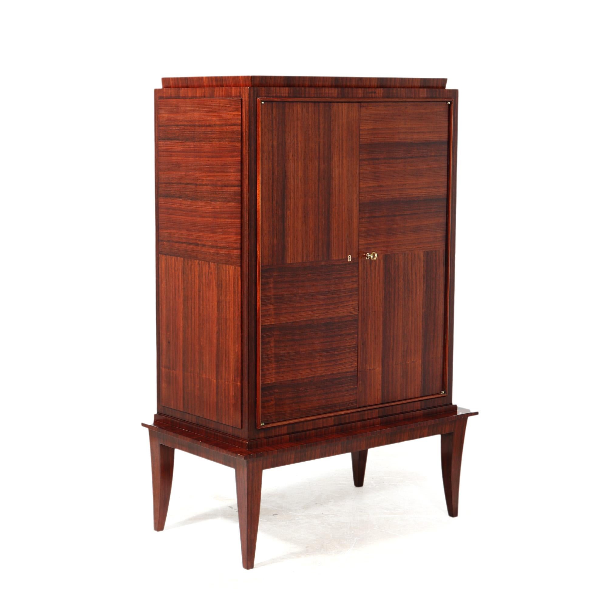 FRENCH ART DECO CABINET
An excellent quality French Art Deco cabinet produced in oak with rosewood veneers, possibly by Andre Domin and Marcel Genevriere for Maison Dominique the cabinet has two doors and a great quality lock with original key with