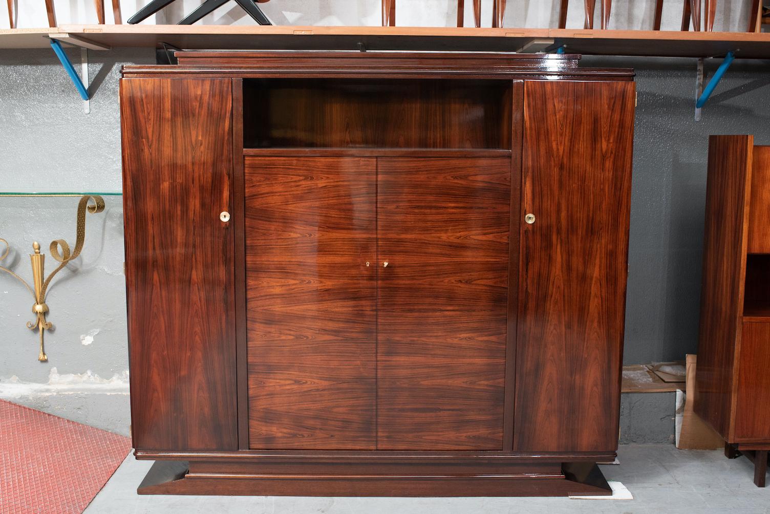 Art Deco rosewood cabinet or bookcase or cabinet with multiple shelves.
 