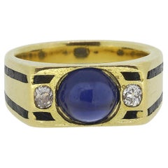 Anello francese Art Deco con zaffiro cabochon e diamante a tre pietre