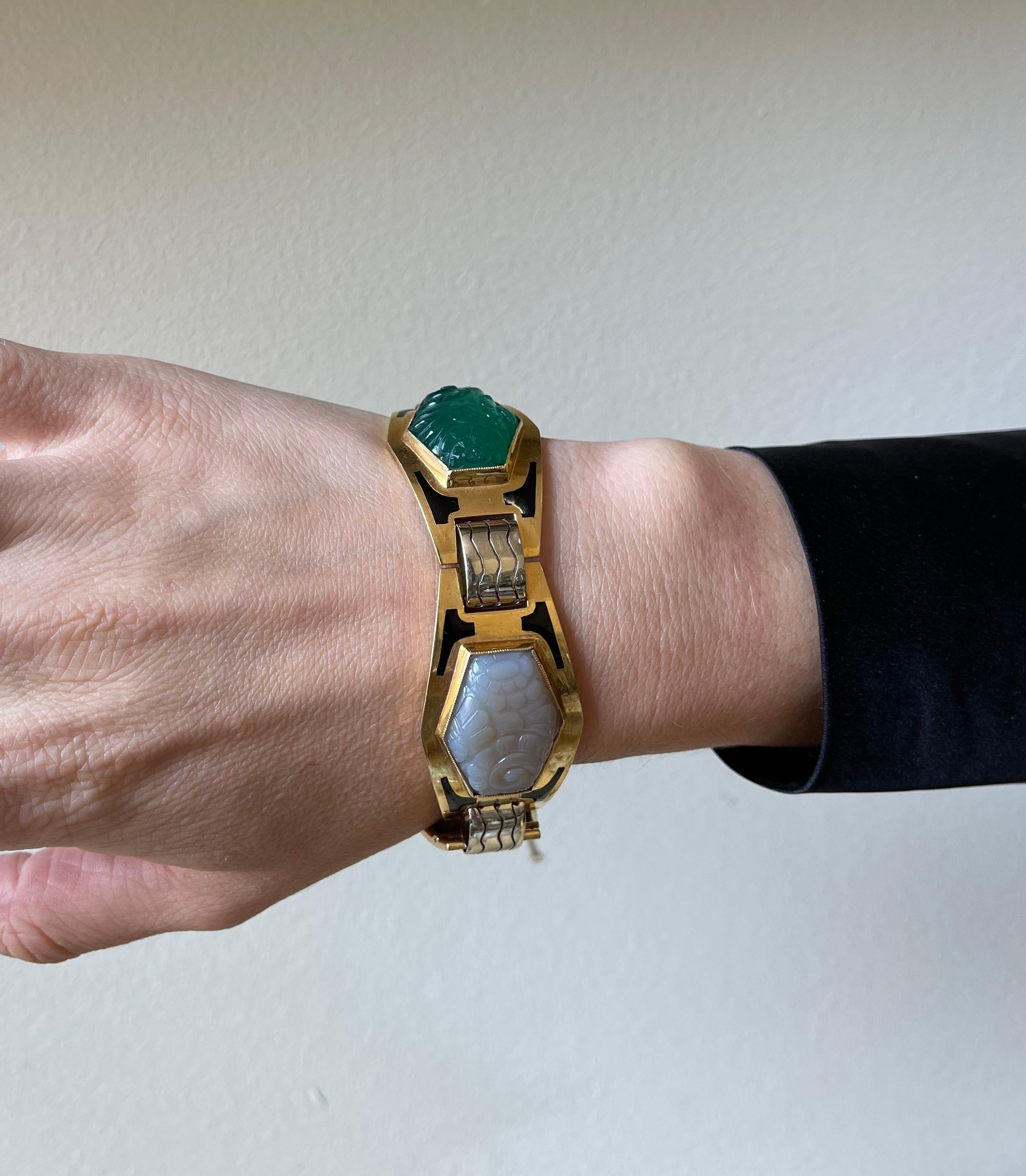 Art Deco beautiful 18k gold French made bracelet, with black enamel (few areas show loss of enamel), as well as carved chrysoprase and chalcedony. Bracelet is 7.5