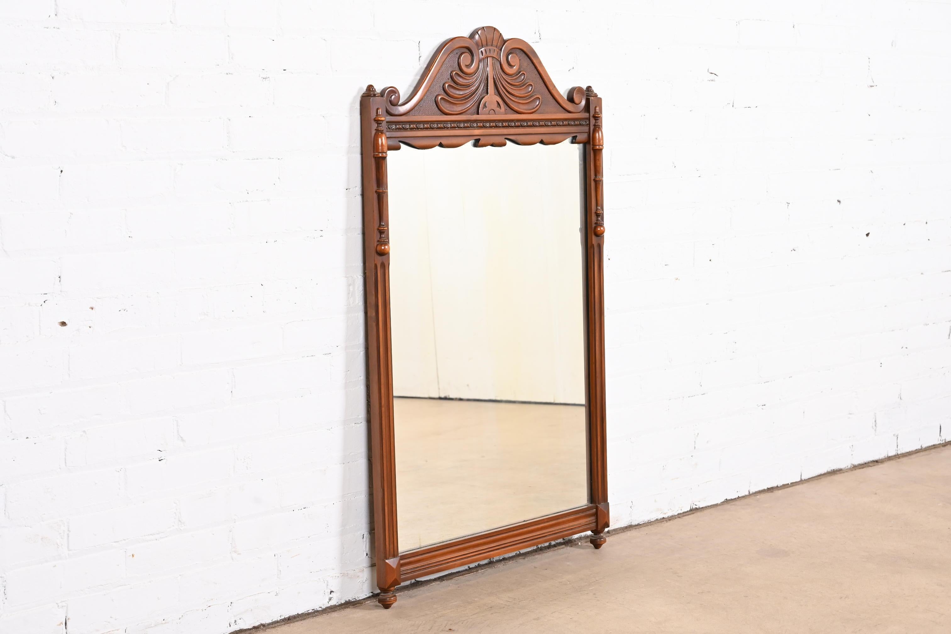 American French Art Deco Carved Walnut Wall Mirror by Landstrom, Circa 1940s For Sale