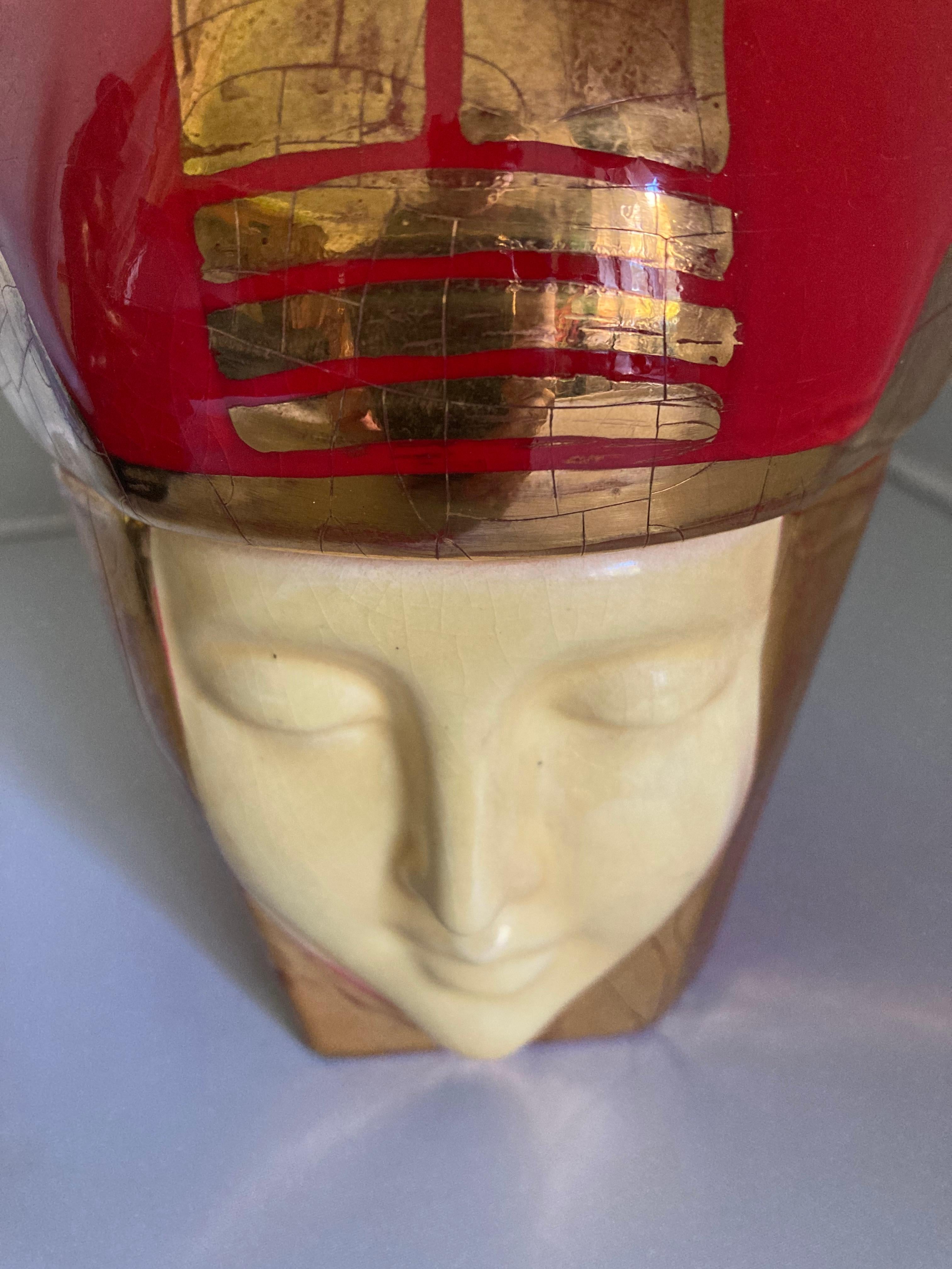 Decorative ceramic Bonbonniere by Robj, Paris from the period of 1925-1930. Original condition, no repairs or restoration.
Bright colors and metalic gold enamel. Woman with crown and gold lines. This figure is beautiful rendered with two parts, top