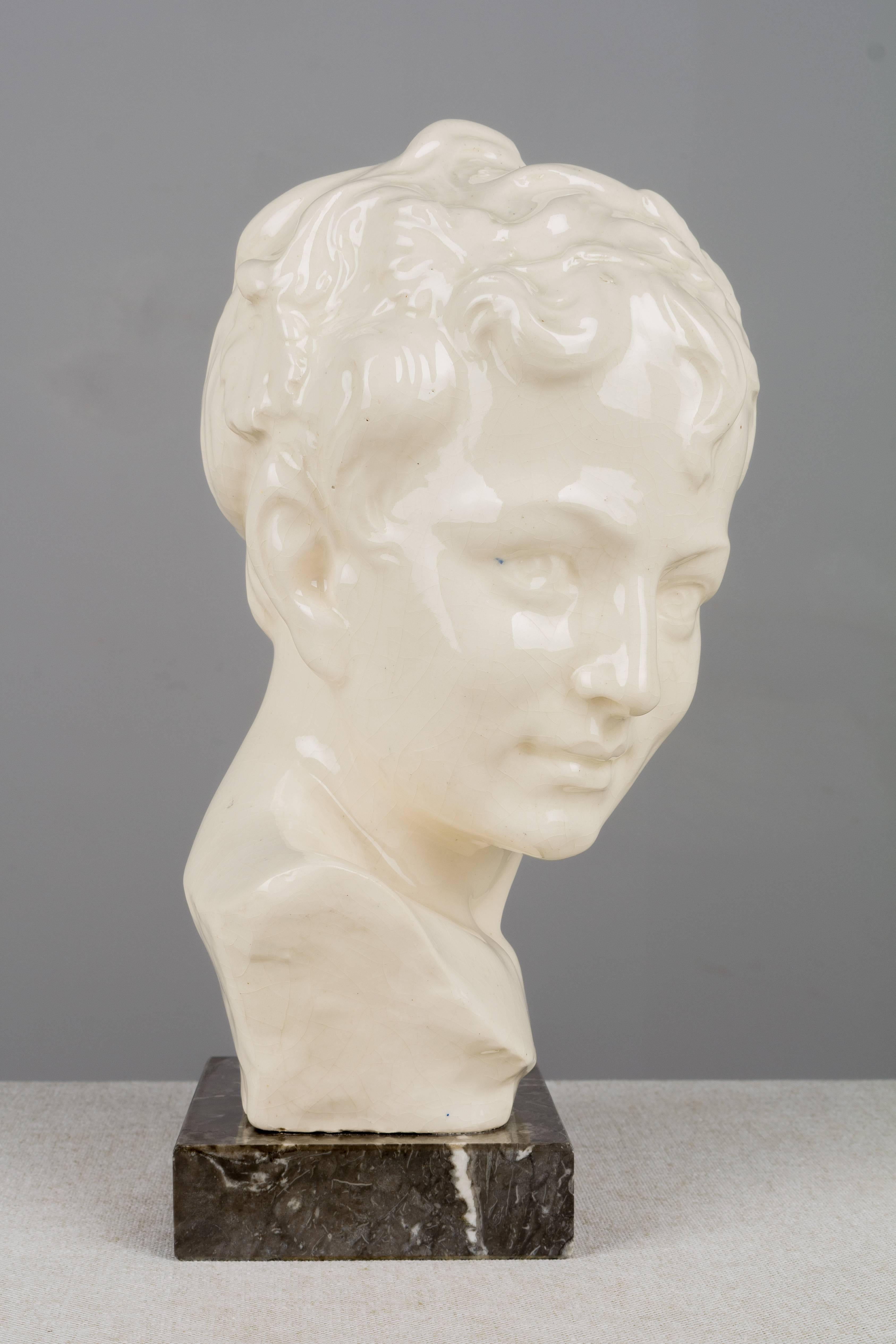 20th Century French Art Deco Ceramic Bust of a Young Faun For Sale