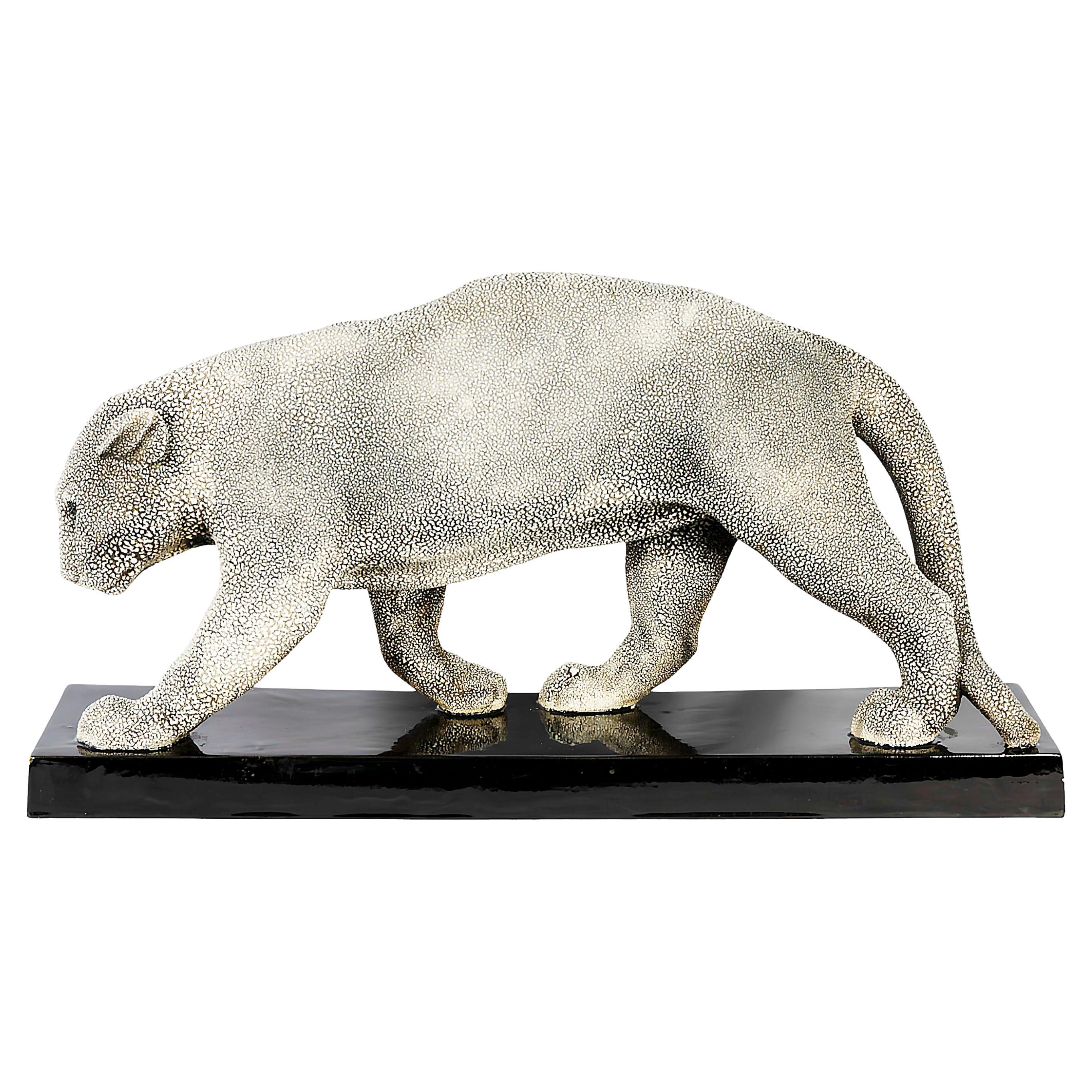 French Art Deco period hand crafted sculpture of a sneaking panther with textured surface on black colour base by Gabriel Beauvais for Edition Kaza.
Edition Kaza is known about there quality ceramics, made by artists created during the Art Deco