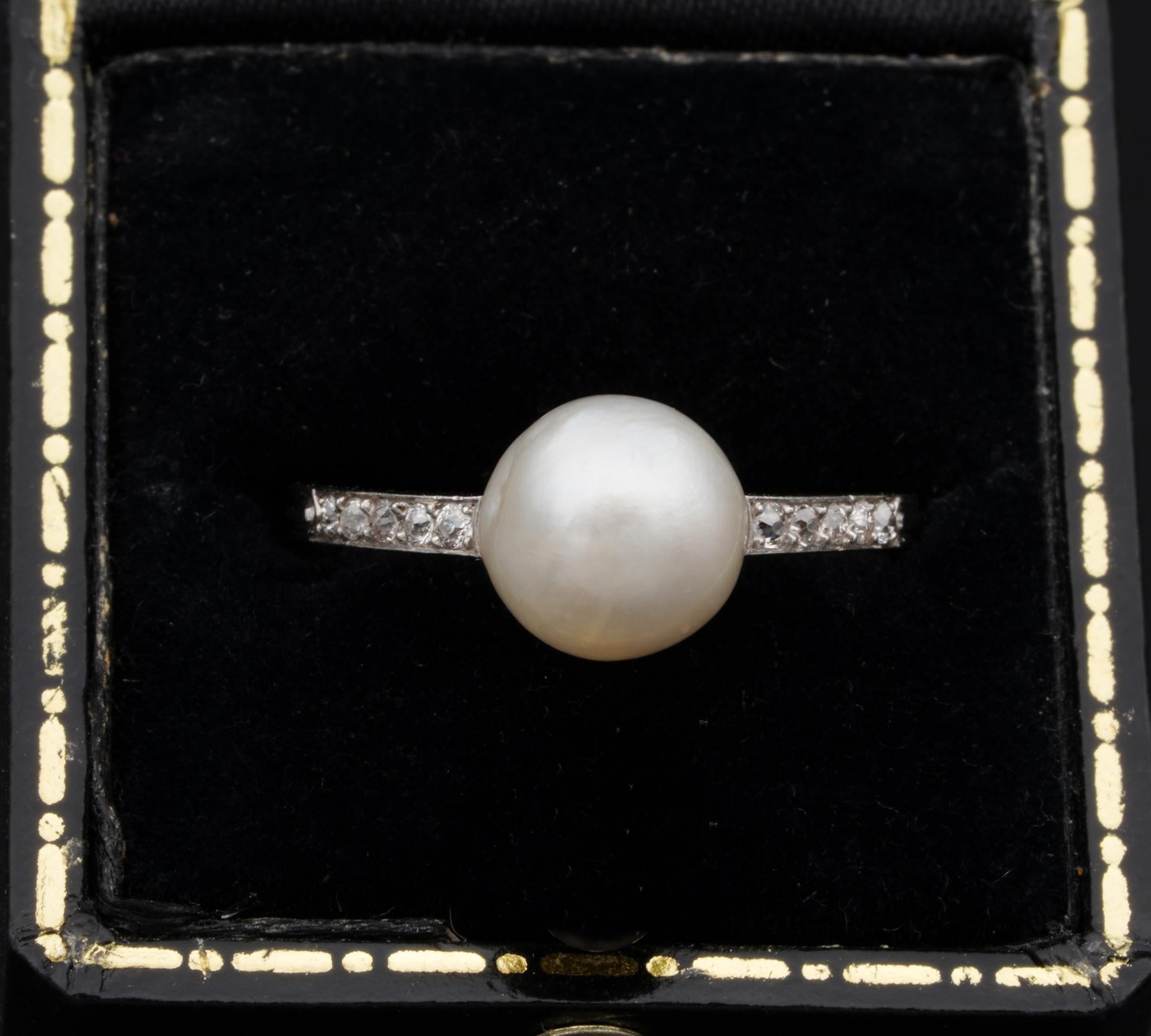 Made By Nature

Beautiful antique French ring set with rare natural – not nucleated sea pearl
Art Deco period, bears French mark for Platinum
Timeless, elegant design as solitaire set for the rare Pearl flanked by old mine cut Diamonds in a simple