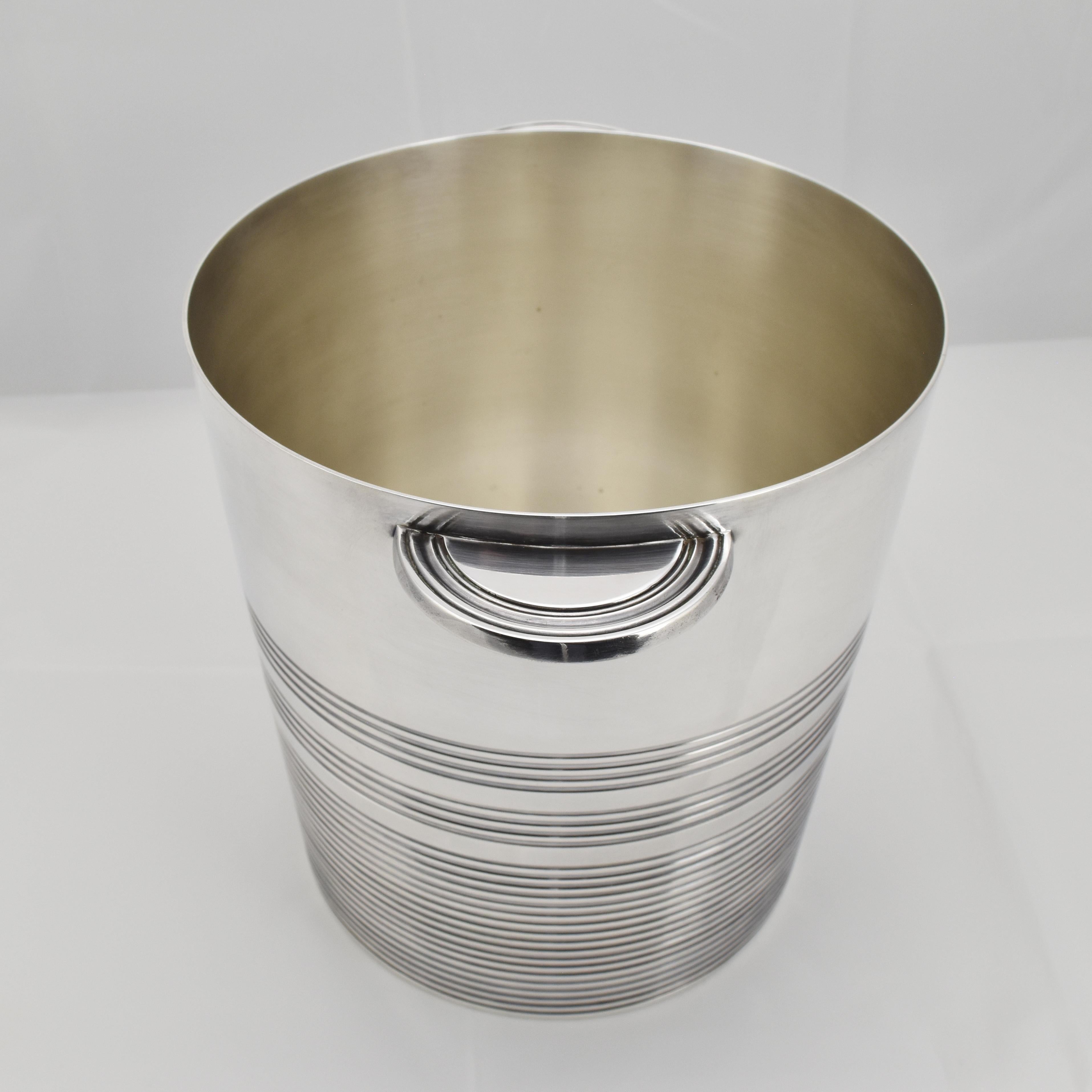 This French Art Deco champagne cooler is an absolutely elegant Modernist masterpiece made by the well-known manufacturer Ercuis in the 1920s.

This piece is not just a functional vessels for chilling champagne, it is also an elegant and