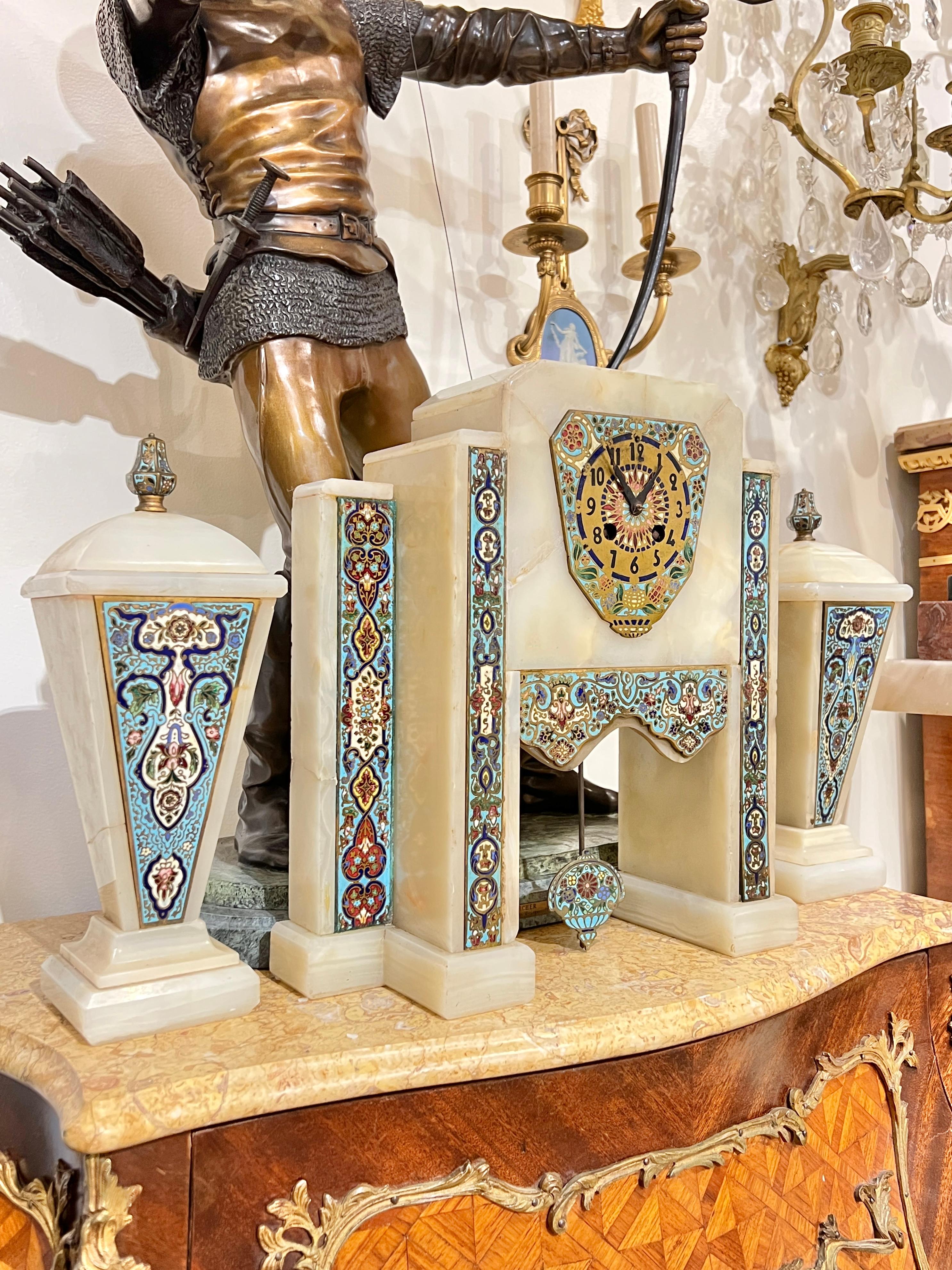 French Art Deco Champleve Enameled Bronze and Onyx Mantel Clock and Obelisks Set In Good Condition For Sale In New York, NY