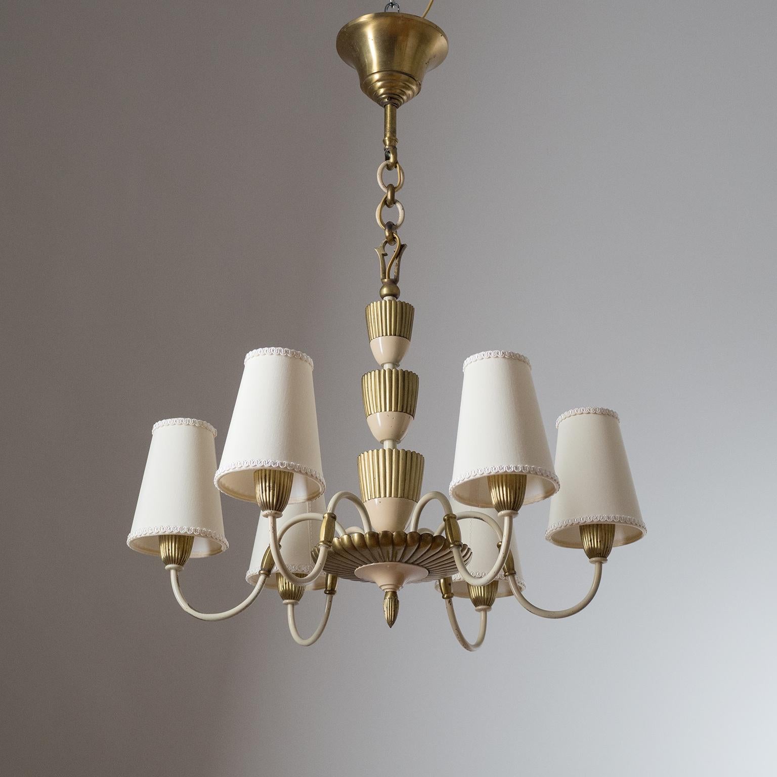 Rare French Art Deco chandelier from the 1930-1940s. All-brass construction, partially enameled in cream, with solid cast brass elements. Good original condition with some patina. Brass and ceramic E14 sockets with new wiring. Height without the