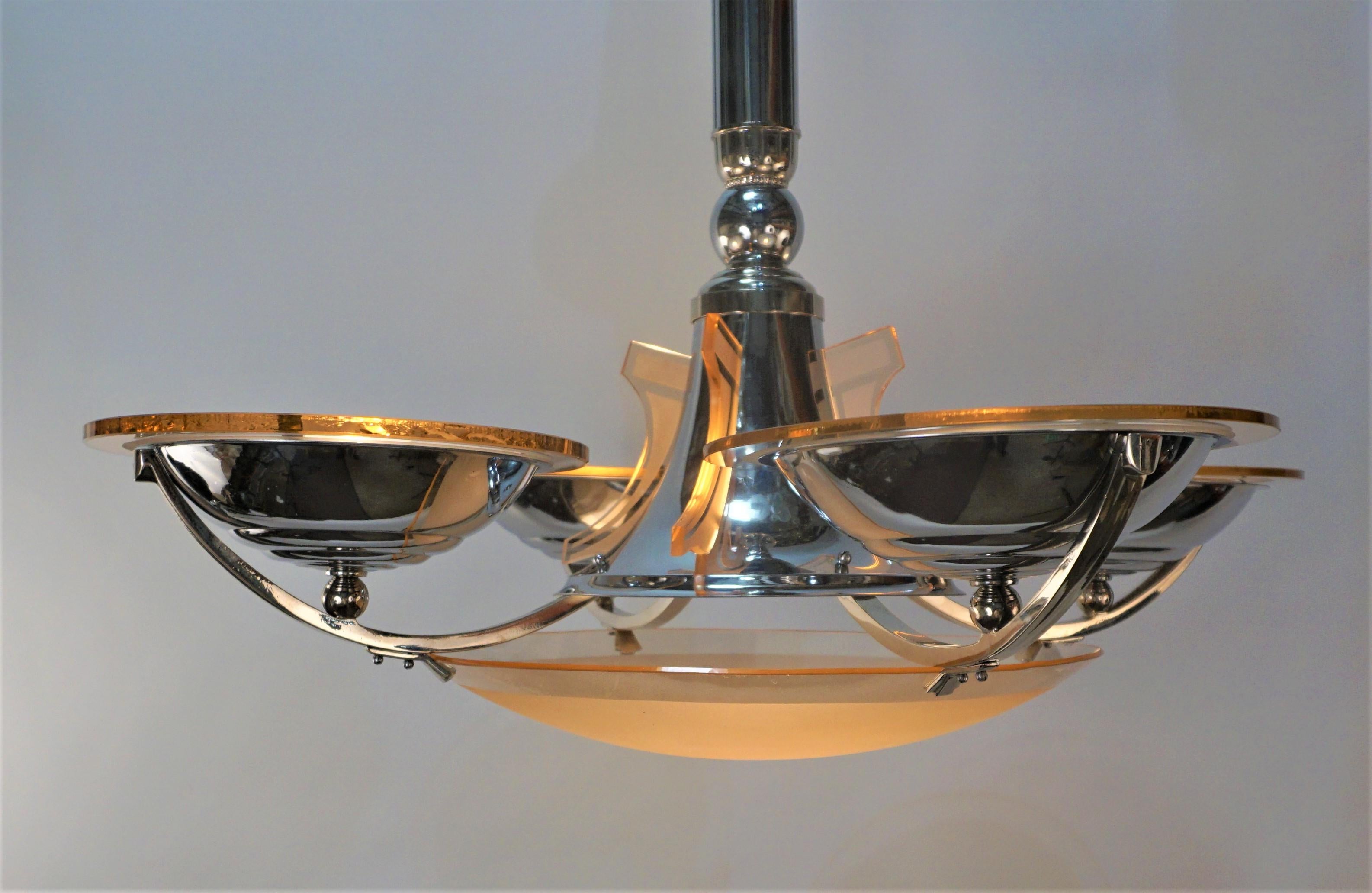 Rare simple but elegant Art Deco chandelier in chrome/nickel over bronze with pink/beige glass.