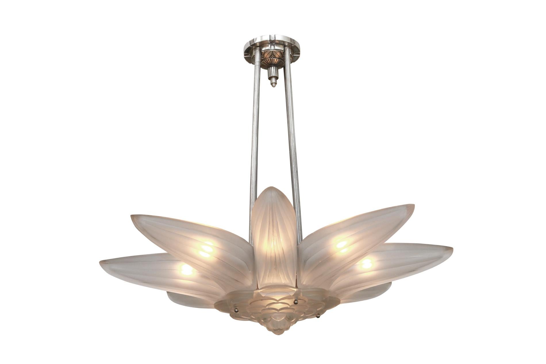 French Art Deco chandelier by Genet & Michon from 1930. Exceptional and rare piece made in all glass with original nickeled bronze structure 19representing a flower. Delicate and elegant, this ceiling light represents the manufacture artwork from