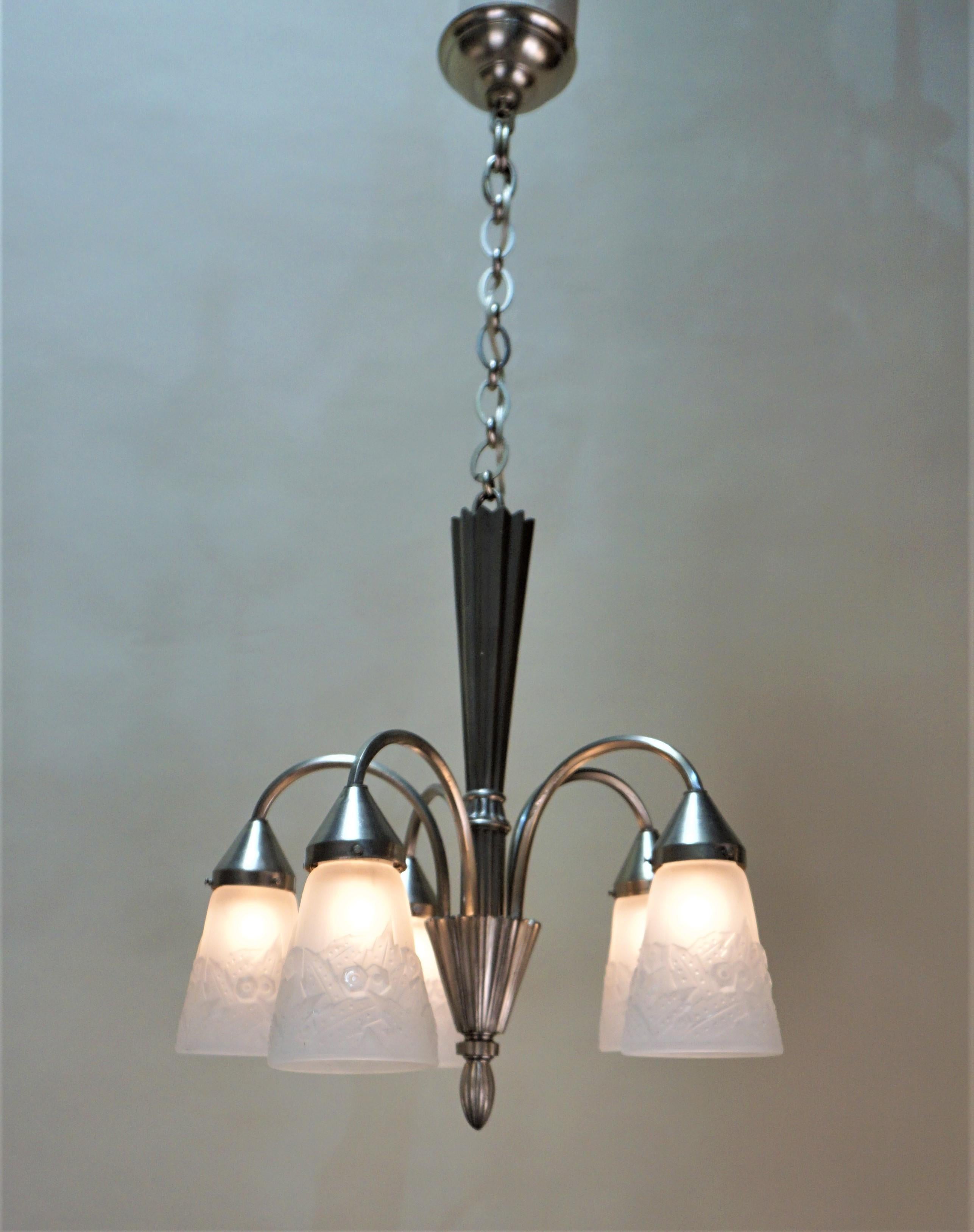 Five-light geometric design and nickel on bronze Art Deco chandelier.