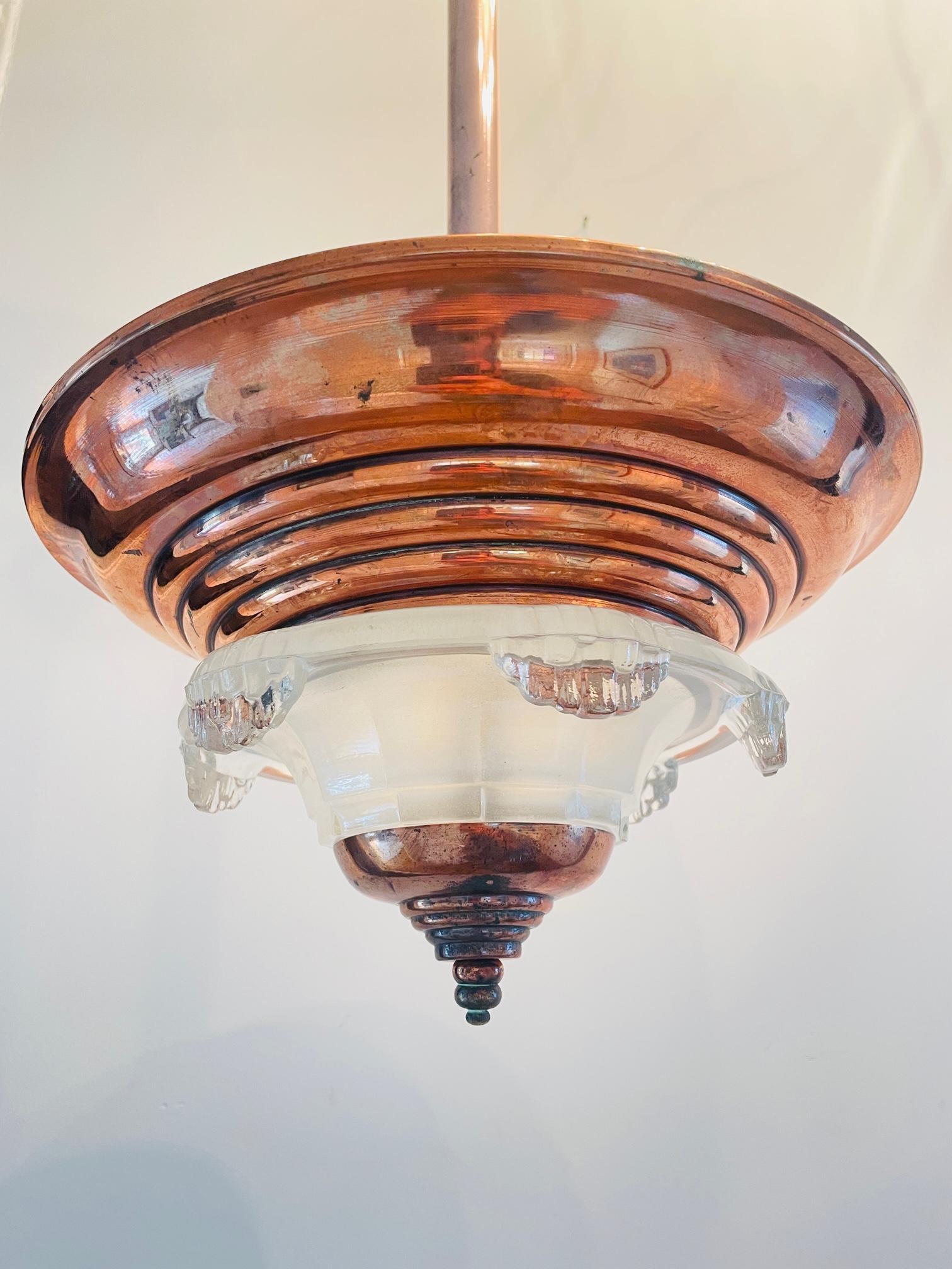 Moulded glass and copper chandelier or lustre, French Luminaire probably made circa 1940. In great vintage condition. Can be polished to 'gold' but I prefer the copper colour like it is now.
Perfect for every bar, home, restaurant, hotel, lobby or
