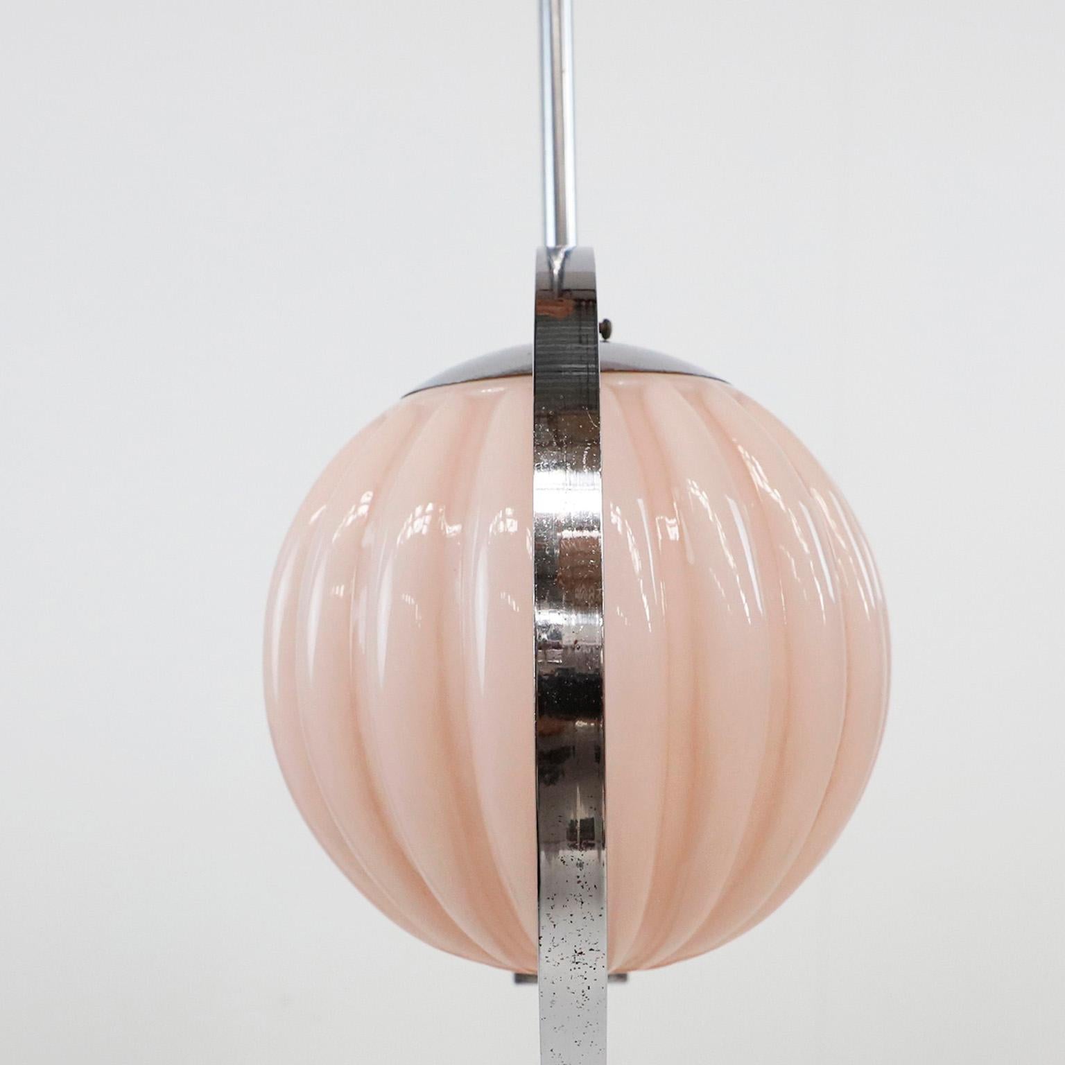 Circa 1930. We offer this French Art Deco Chandelier splendid chromium-plated chandelier / ceiling light features two pink globe glass light shades.