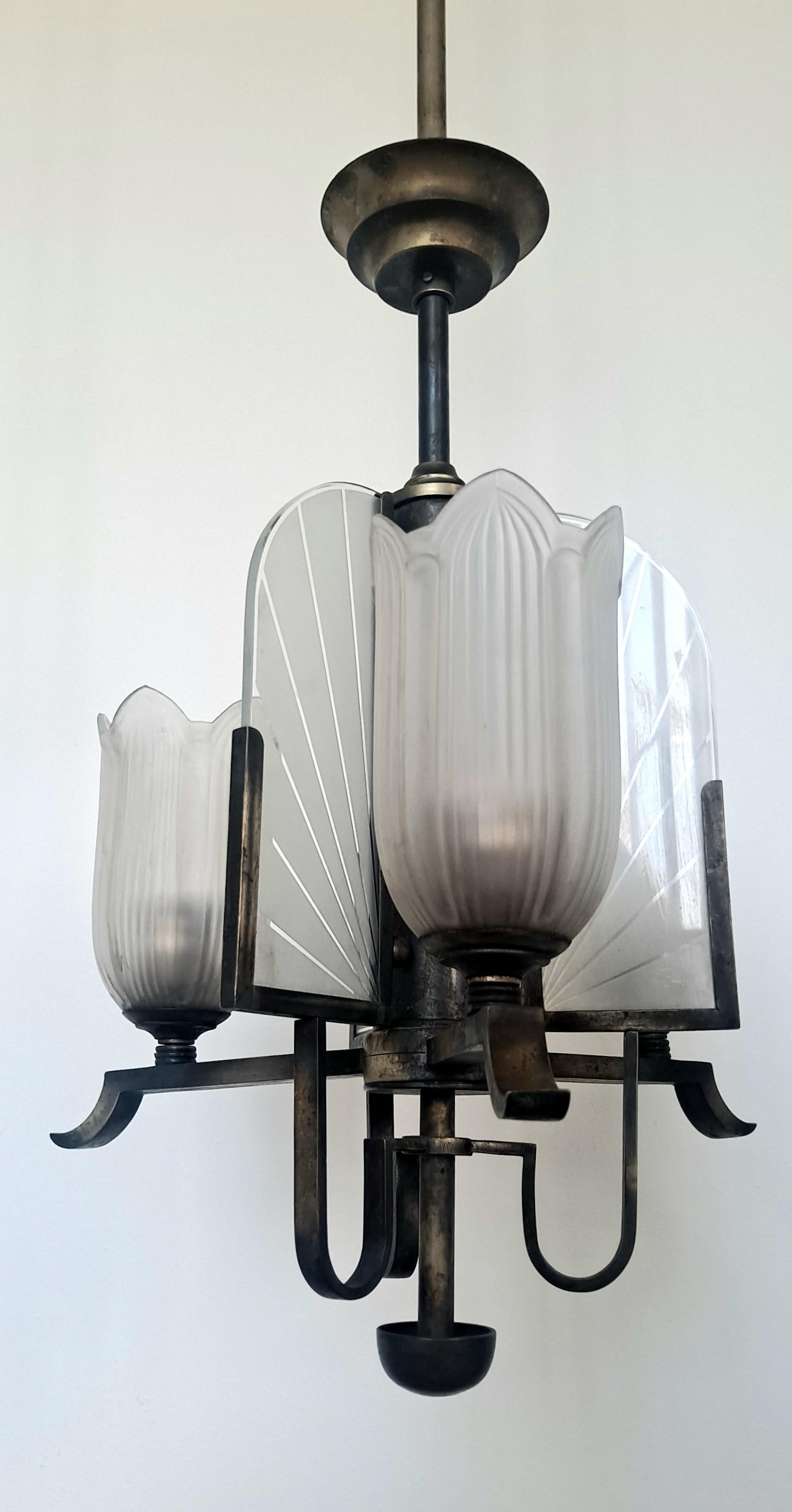 Chandelier is original from the Art Deco period we did not alternate or rewire.
We can rewire it for you.