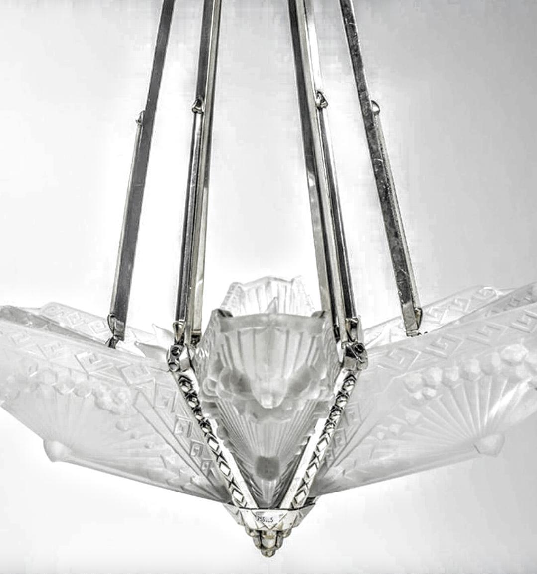This French Art Deco chandelier, known as the Dragonfly was created by the French Artist 