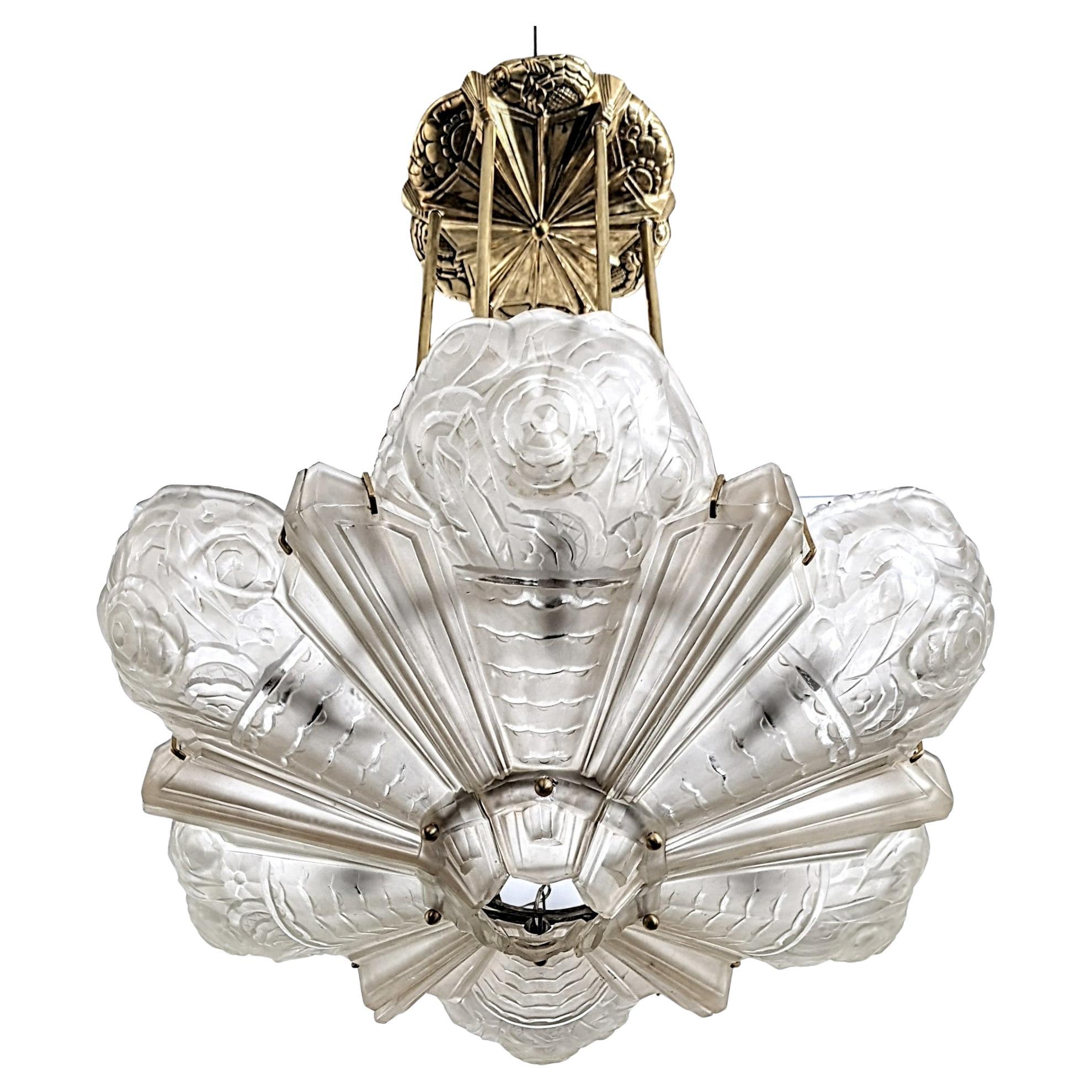 A substantial and rare French art deco chandelier from the 1930’s was designed by the glass master 