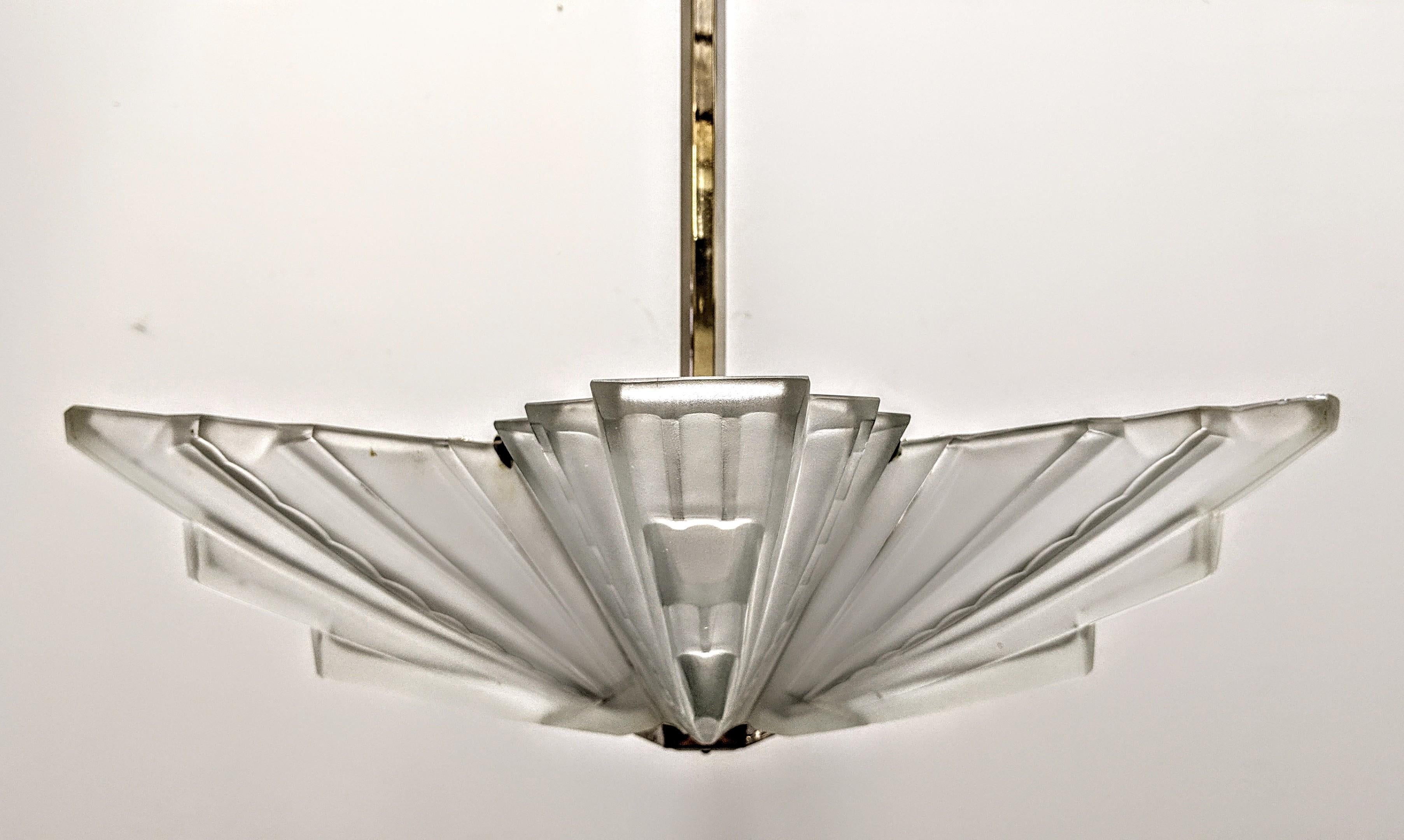 
A rare French Art Deco chandelier from the 1930's was designed by the glass master 