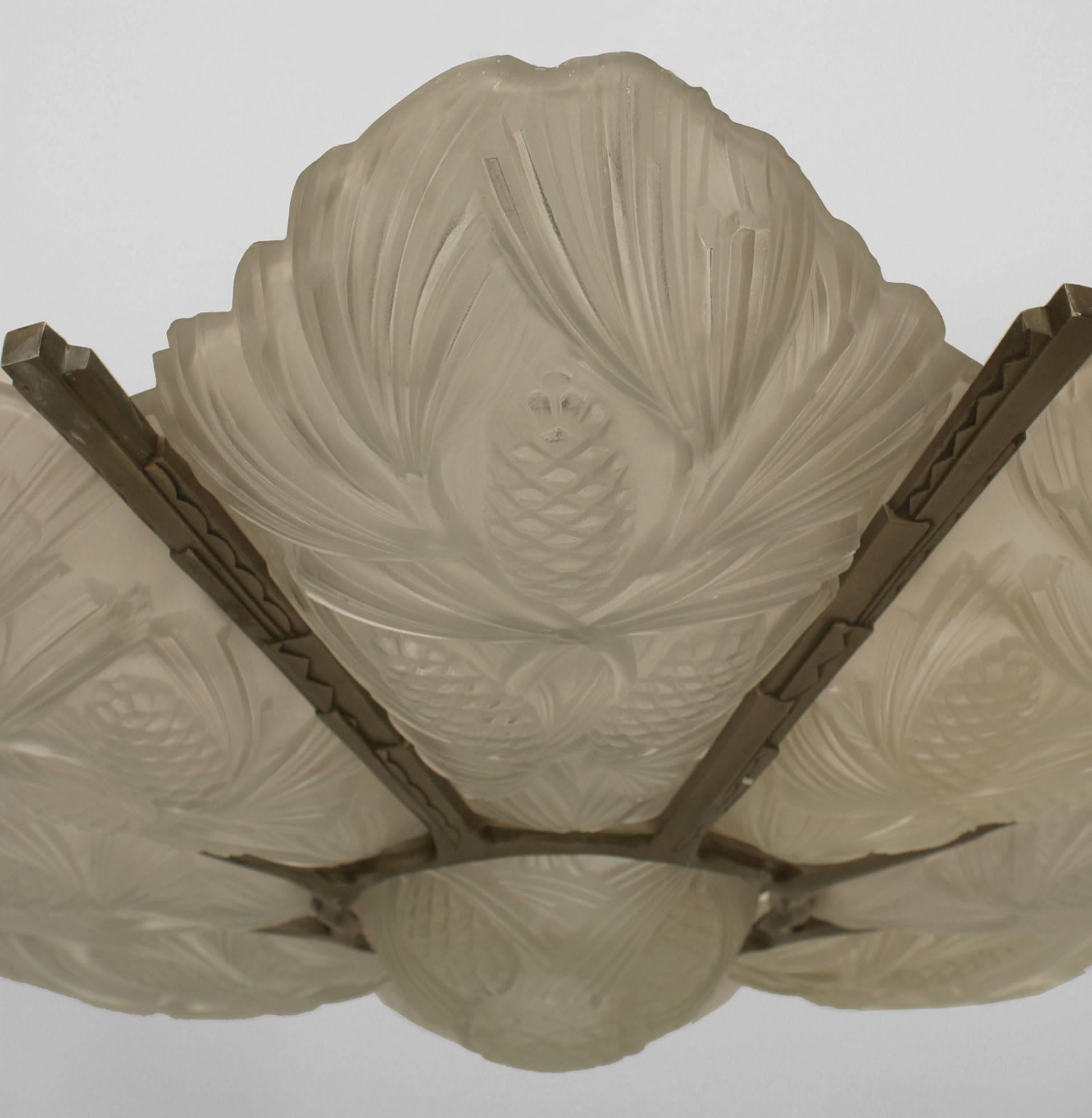 French Art Deco chandelier with 8 frosted floral design panels supported on a round metal frame with a center bottom shade (signed SABINO -ref: pg 219 AN & AD Lamps)
