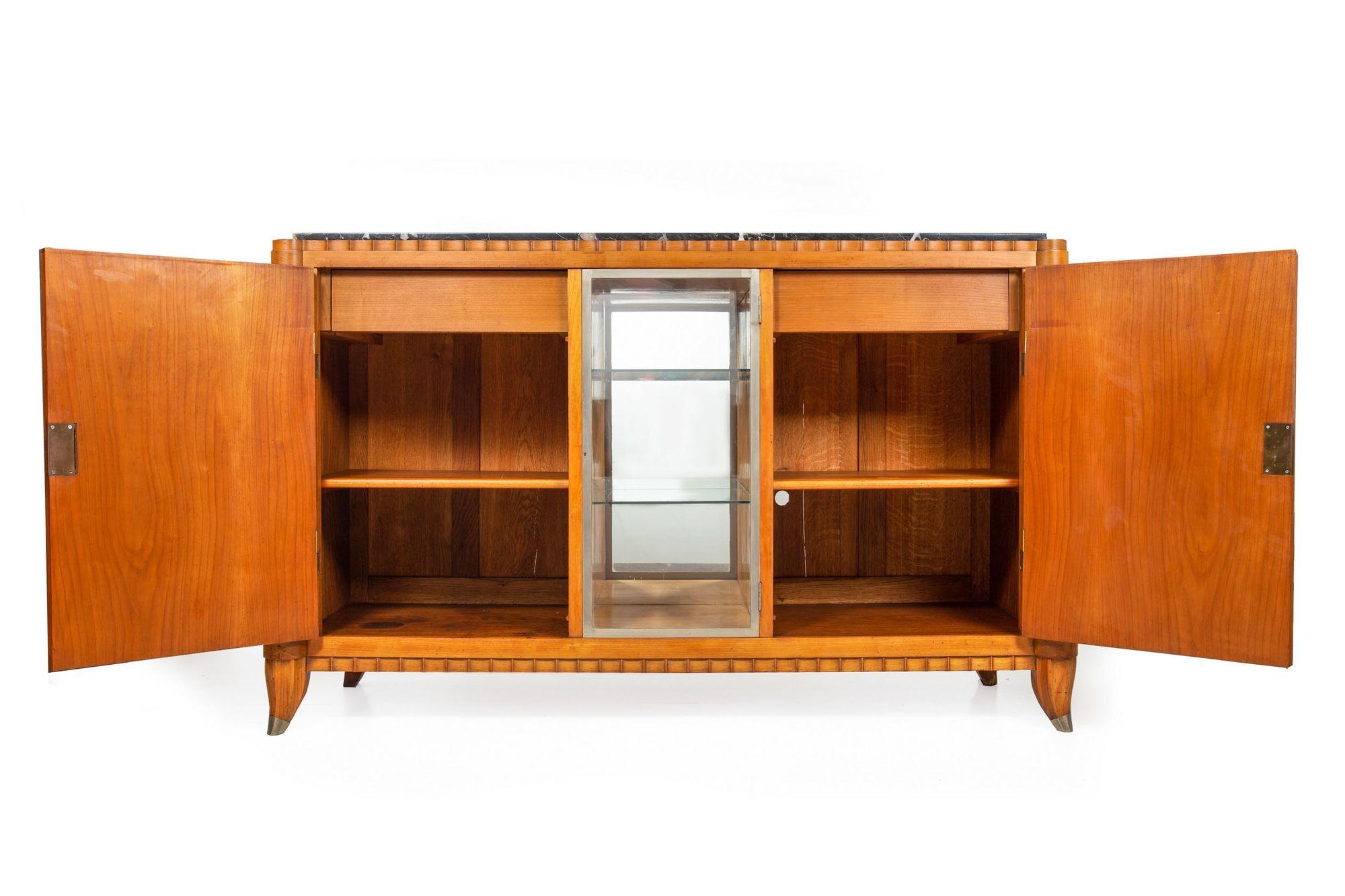 ART DECO CHERRYWOOD, NICKEL, GLASS AND MARBLE SIDEBOARD
France, circa first quarter of the 20th century
Item # 303XDB21A 

A gorgeous and also most functional sideboard from the first quarter of the 20th century, it is executed in solid cherrywood