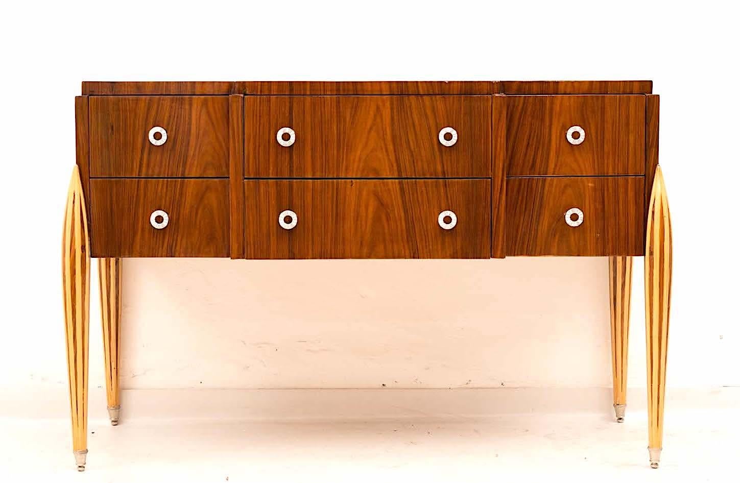 Art Deco dresser with six drawers and hammered brass hardware, inlaid fluted legs. This commode an elegant look offer ample storage space, is in perfect vintage condition.