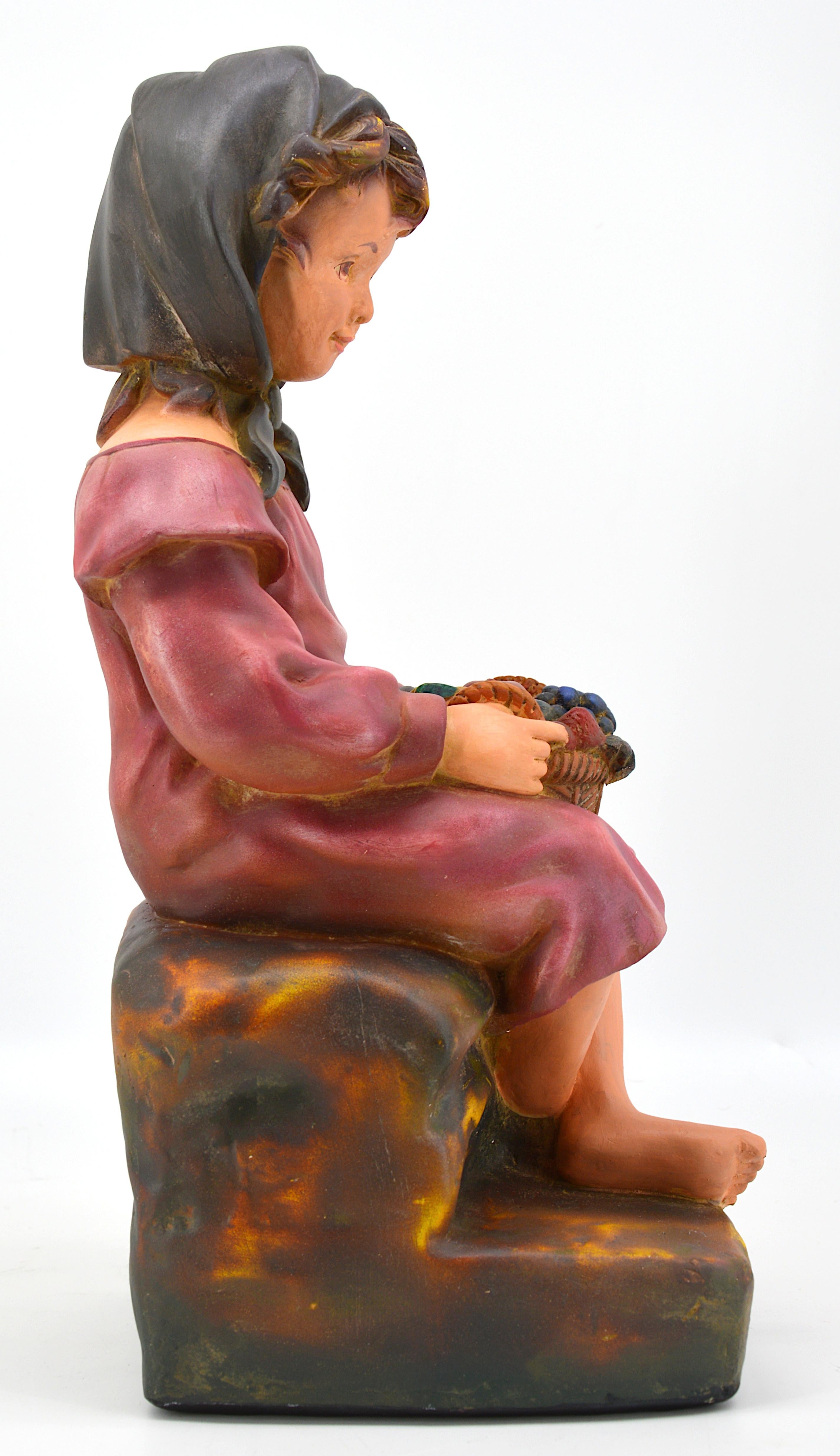 French Art Deco child sculpture, France, 1920s. Country corner - Child with a fruit basket. Polychrome plaster. Measures: height : 15.2