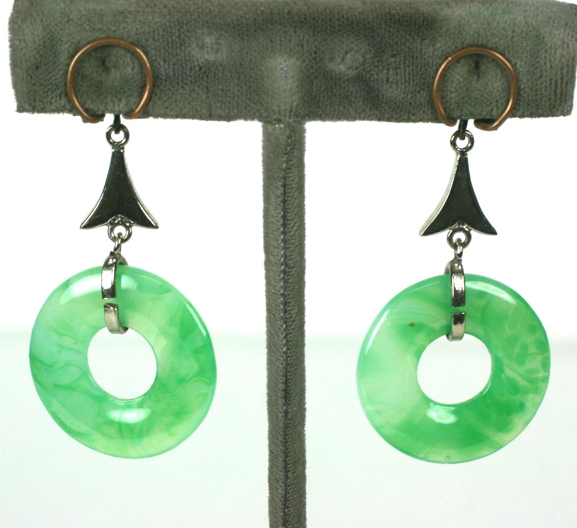 French Art Deco Chinoiserie faux jade pate de verre drop ear clips. Composed of flat round glass rings, cabochons  and triangular marcasite stations of rhodium plate metal.
Excellent Condition.  Clip Back Fittings
Marked Made in France Depose
Length