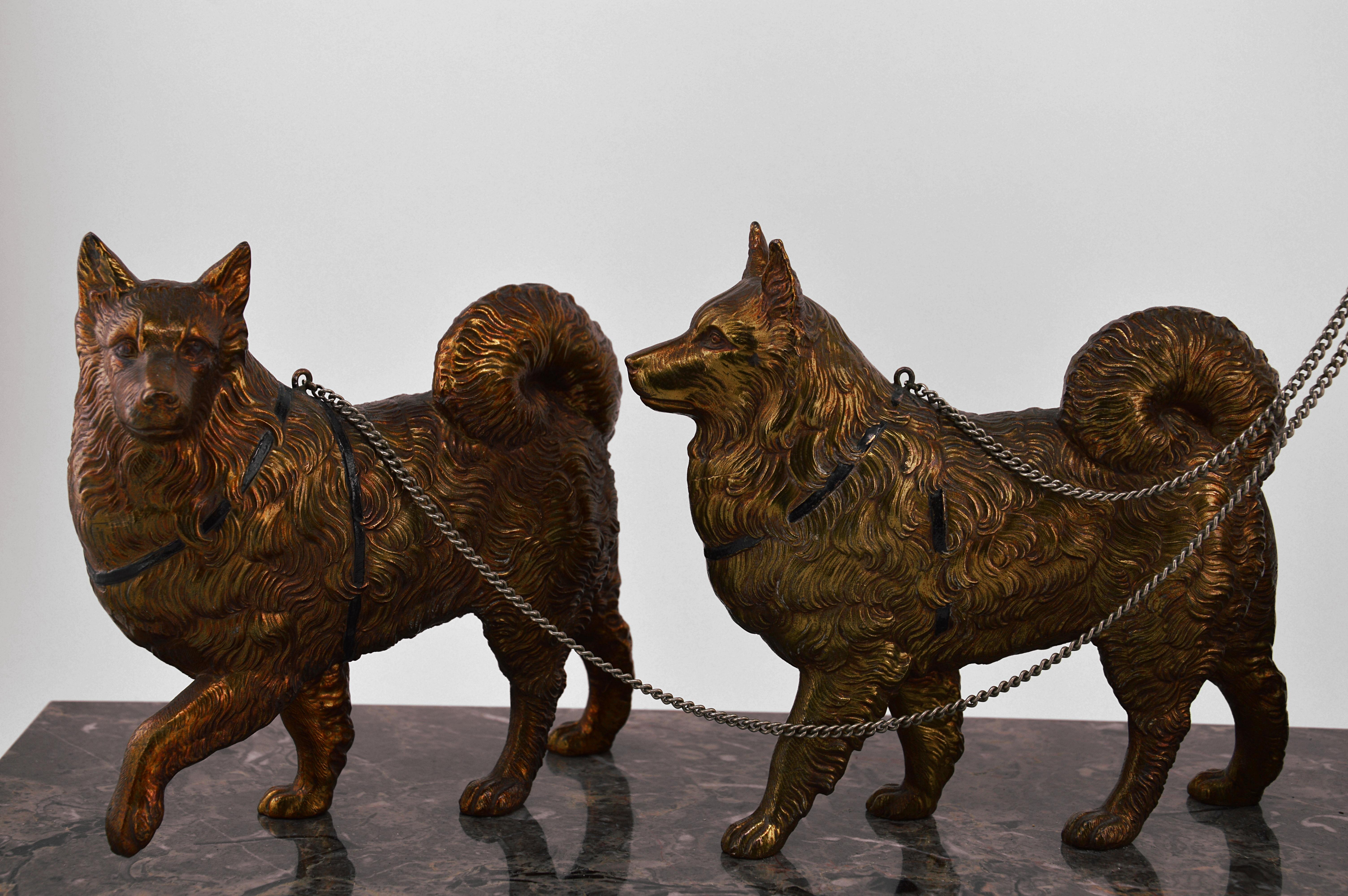 Lady with a couple of chow-chows sculpture by Cham, France, 1930s. Spelter and marble.