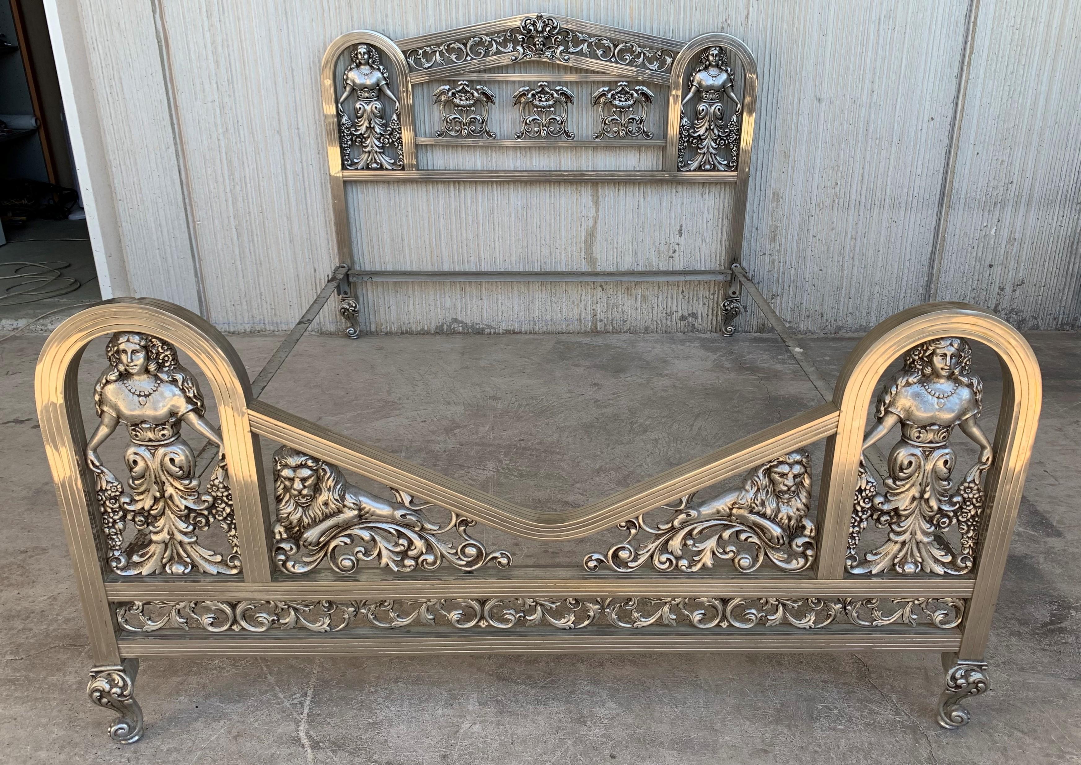 French Art Deco chrome bed with reliefs depicting a Goddess and lions with ornamental decorations.