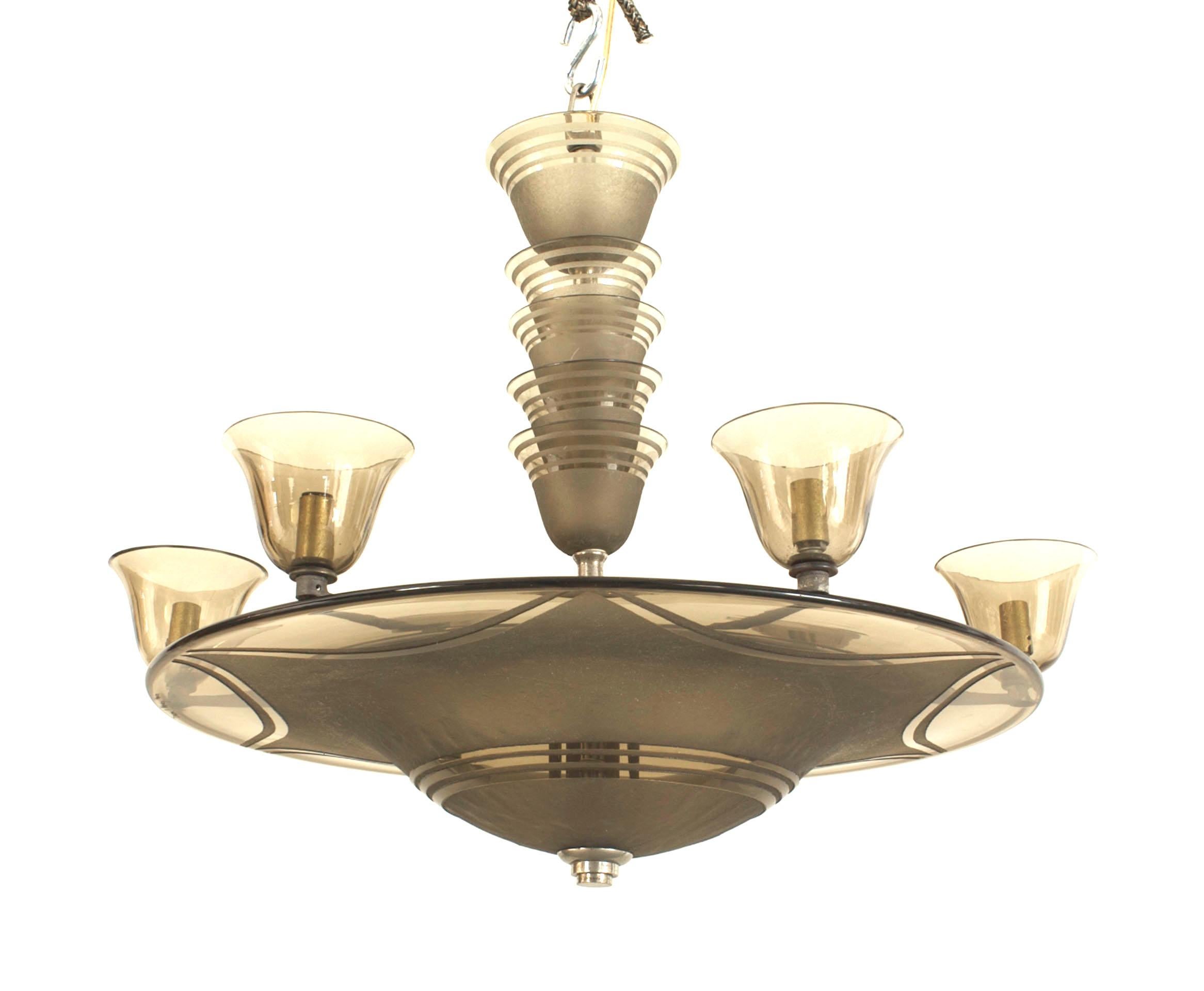 French Art Deco (circa 1937) smoky glass dome shaped chandelier with an acid-etched swag and circular design supporting 6 light shades and a tiered center post (signed: DAUM NANCY).
  