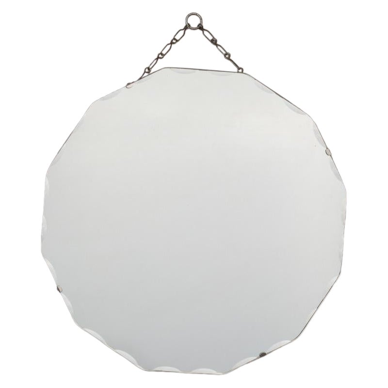 Miroir circulaire à bords biseautés de style Art déco français