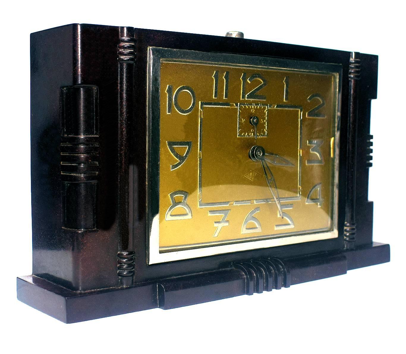 Impressive large 1930s Art Deco Bakelite table or mantel clock by the French company Japy. Great geometric bakelite case and numerals. As with all of our clocks this is in full working order. Condition is excellent with little to no signs of its age.